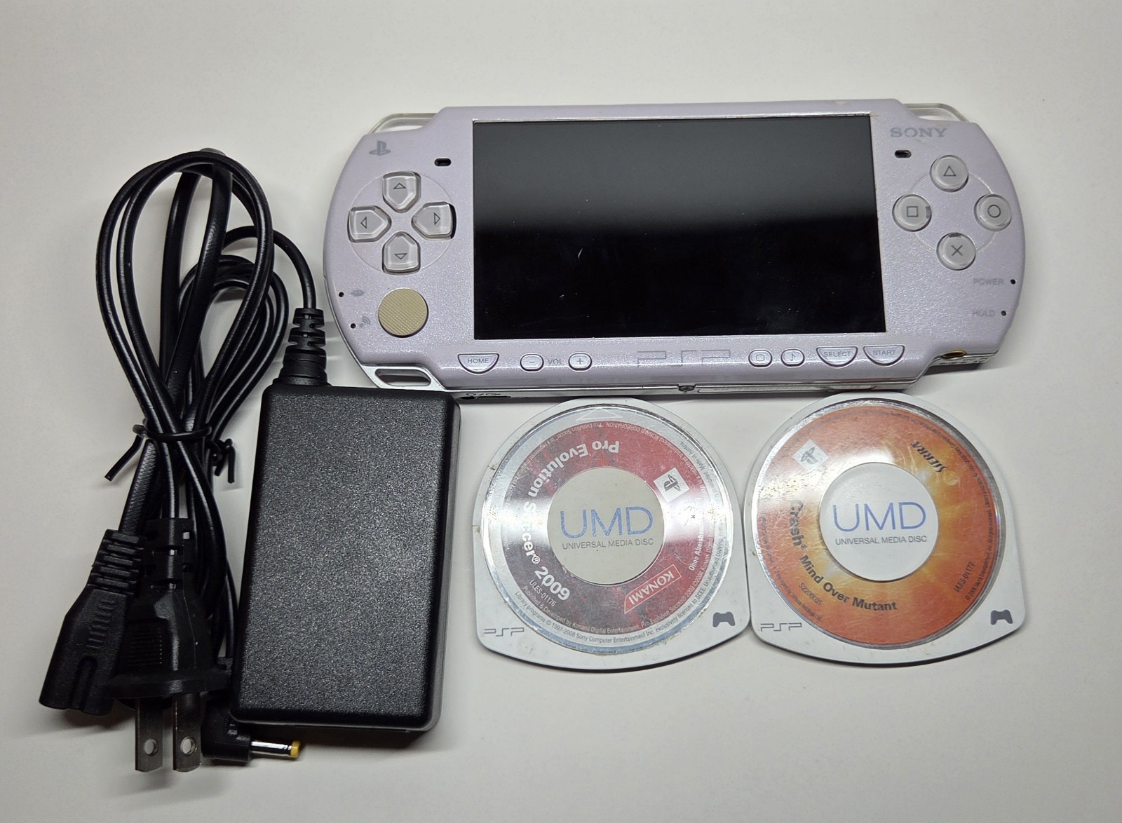 Sony PSP 2000 Lavender Lilac Purple OEM + New Battery, Charger, and 2 Games