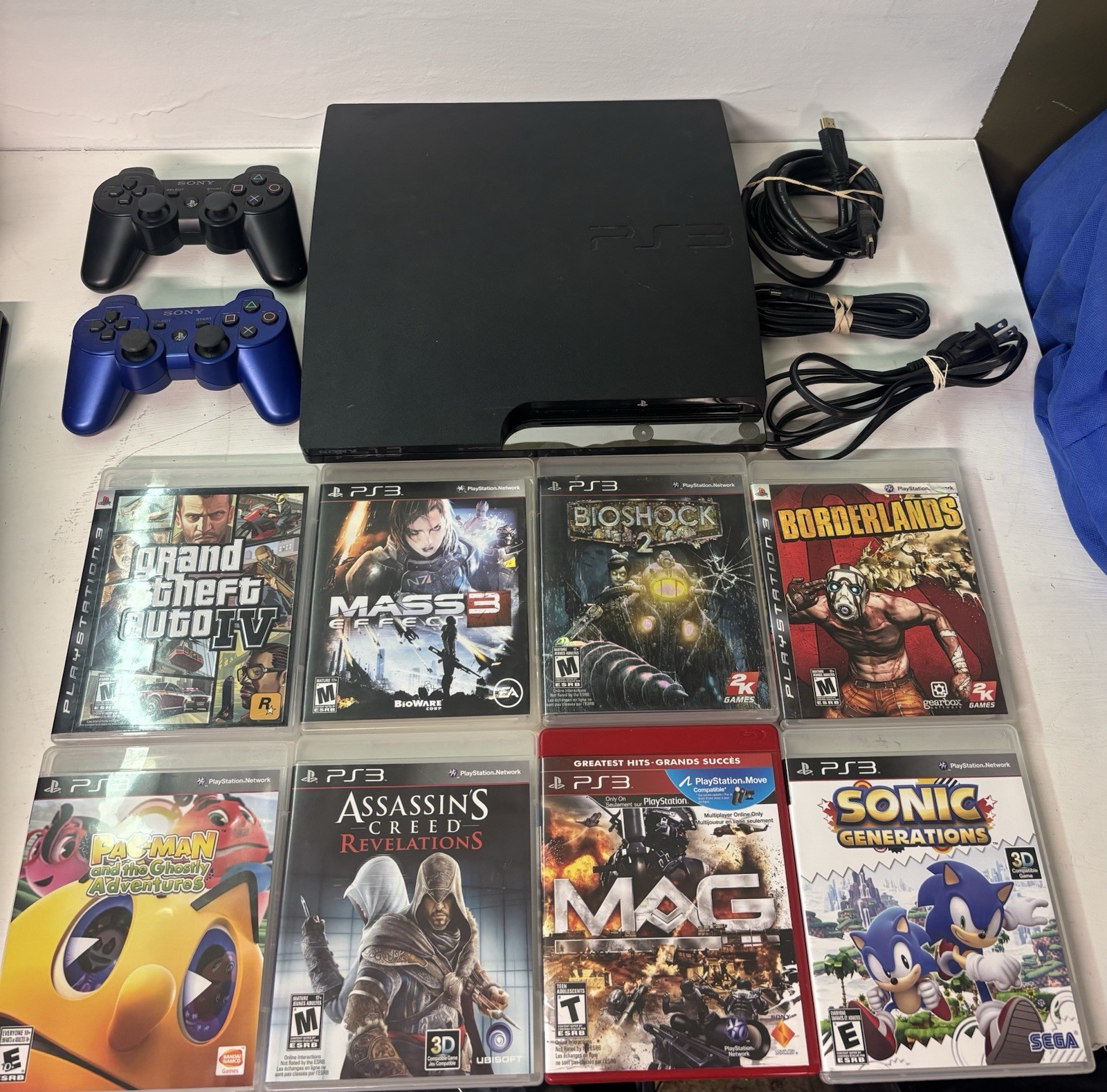 Sony PlayStation 3 PS3 Slim (CECH-2501B) Console + 2 Controllers 8 Games Tested