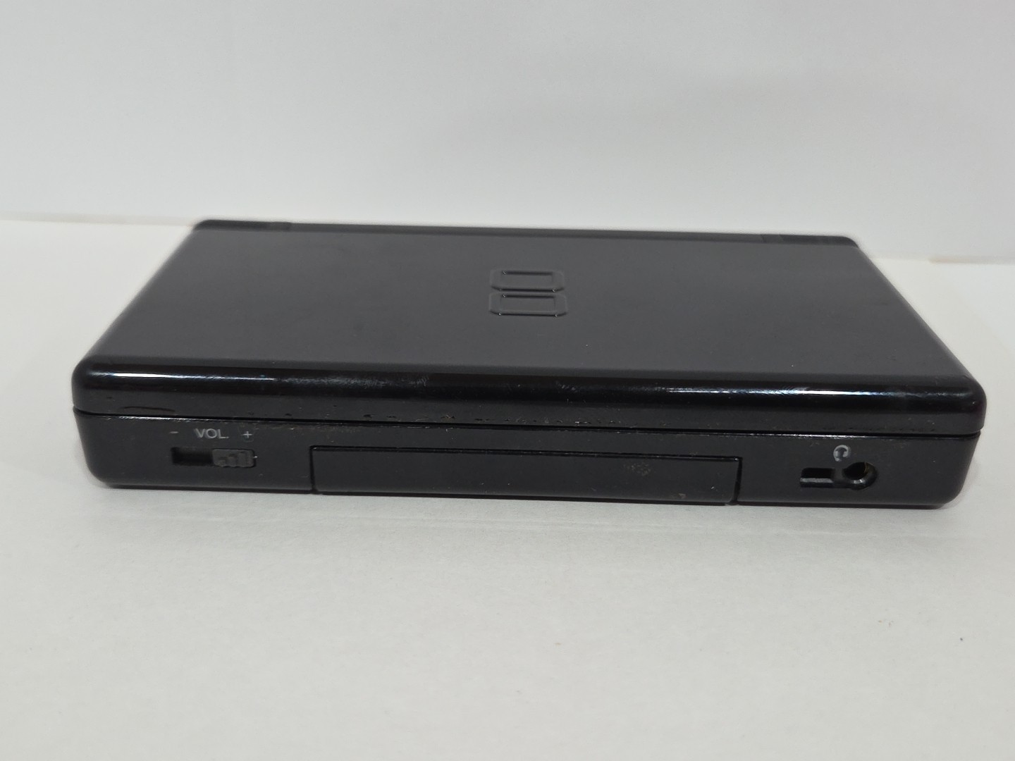 Nintendo DS Lite Console (Black) + 4 Games + Purple Case