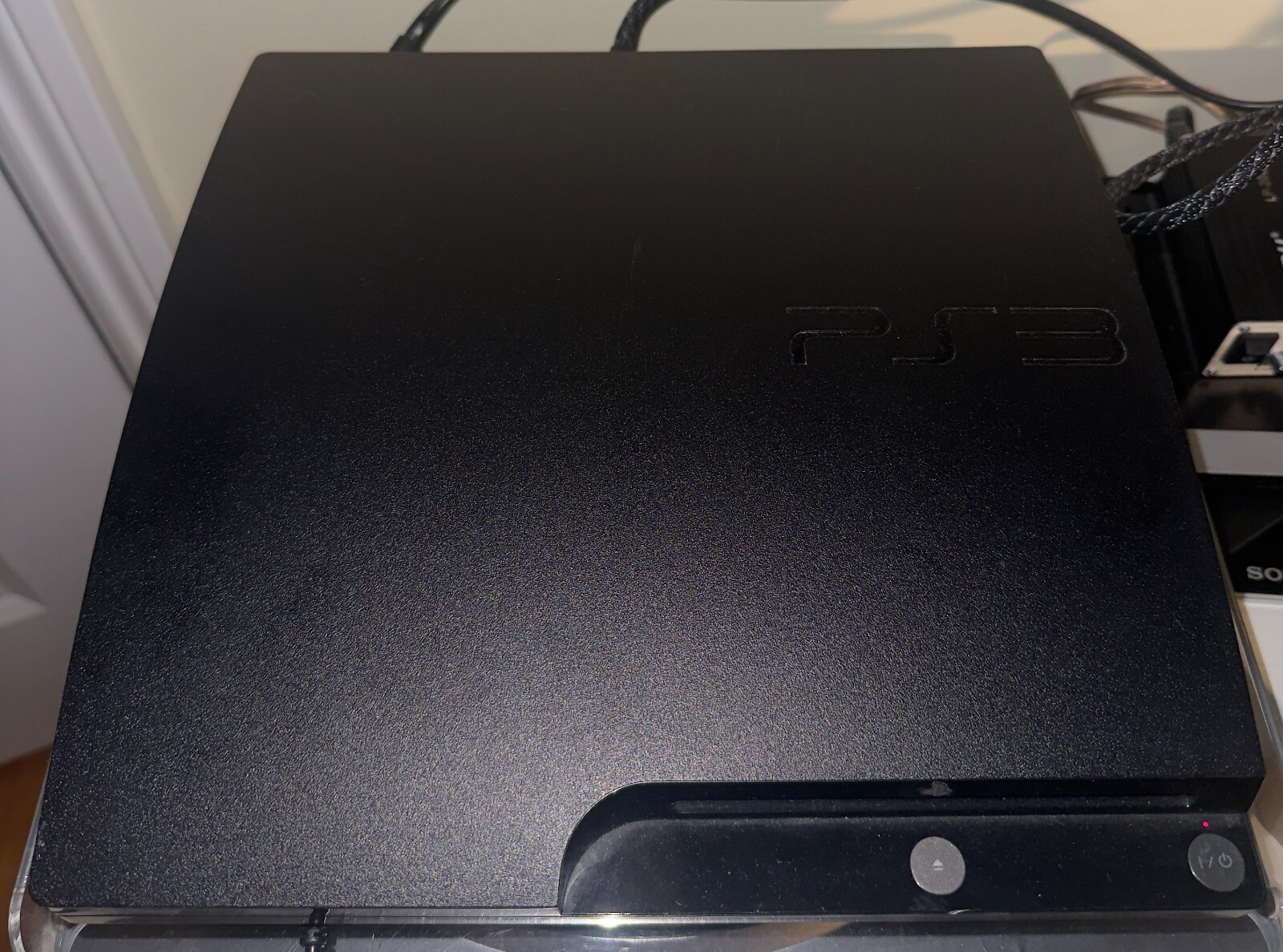 Sony PlayStation 3 Slim + Cables & Controller +TLOU I Installed (Digital)
