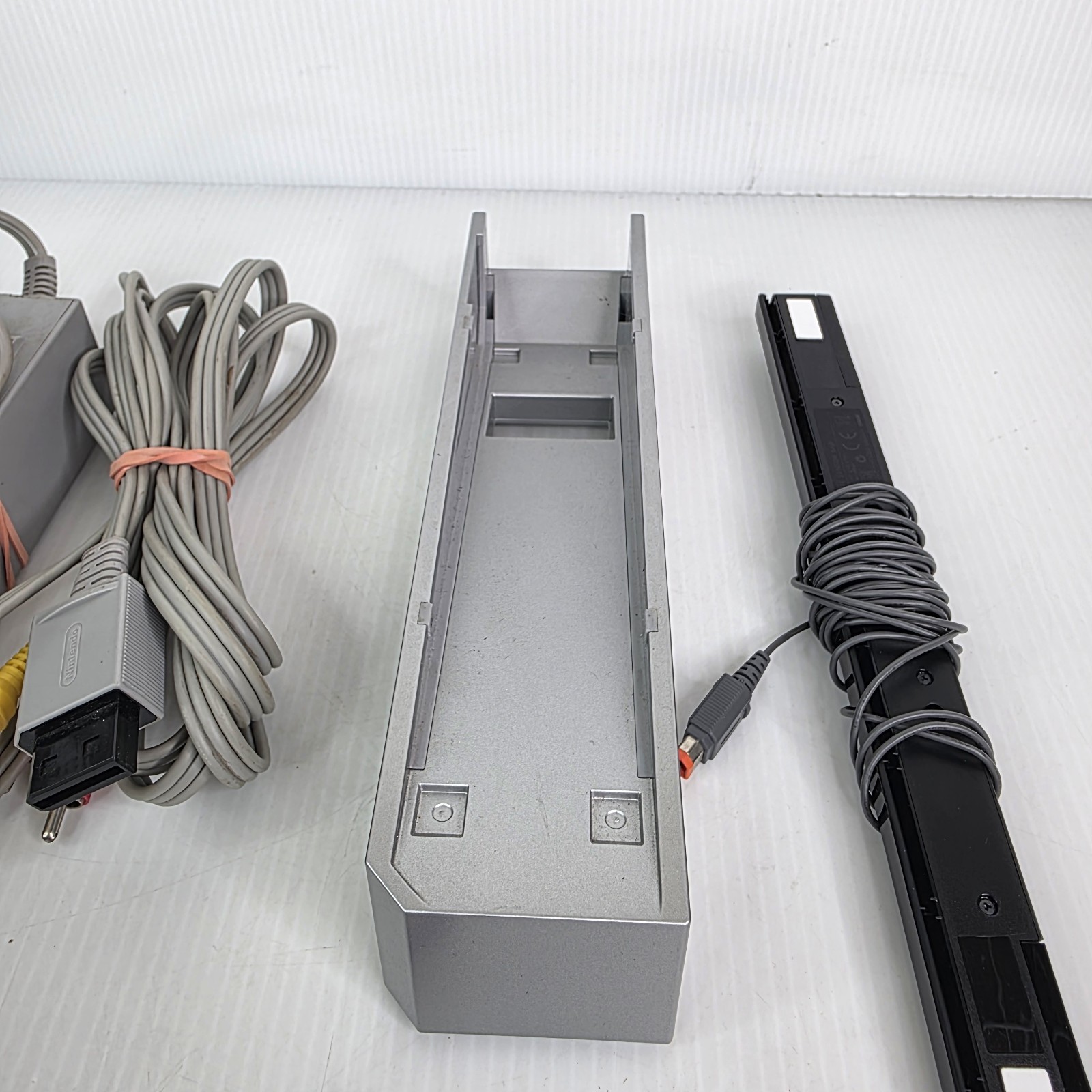 Nintendo Wii Console w/ OEM Stand, Motion Sensor Bar, Cables, SD Card – Works!
