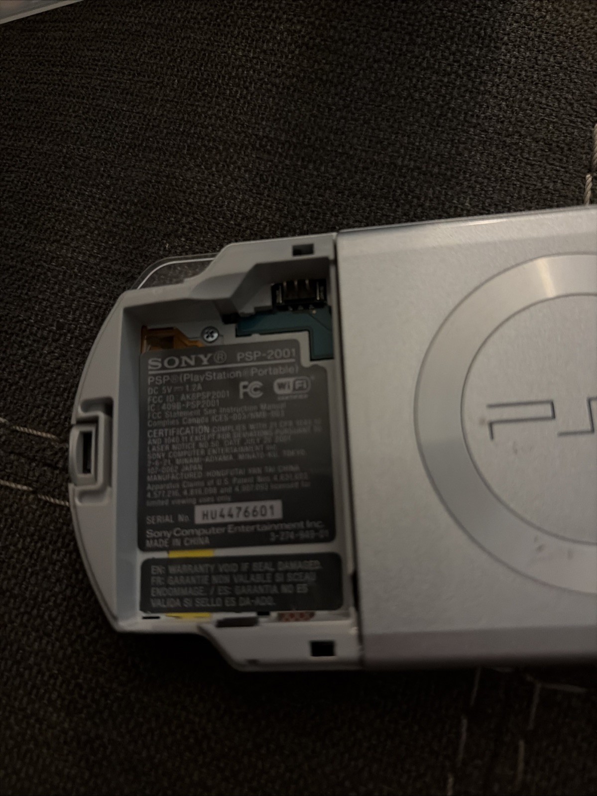 Sony PSP 2001 Handheld Console System Silver with 3 games and 1 movie.