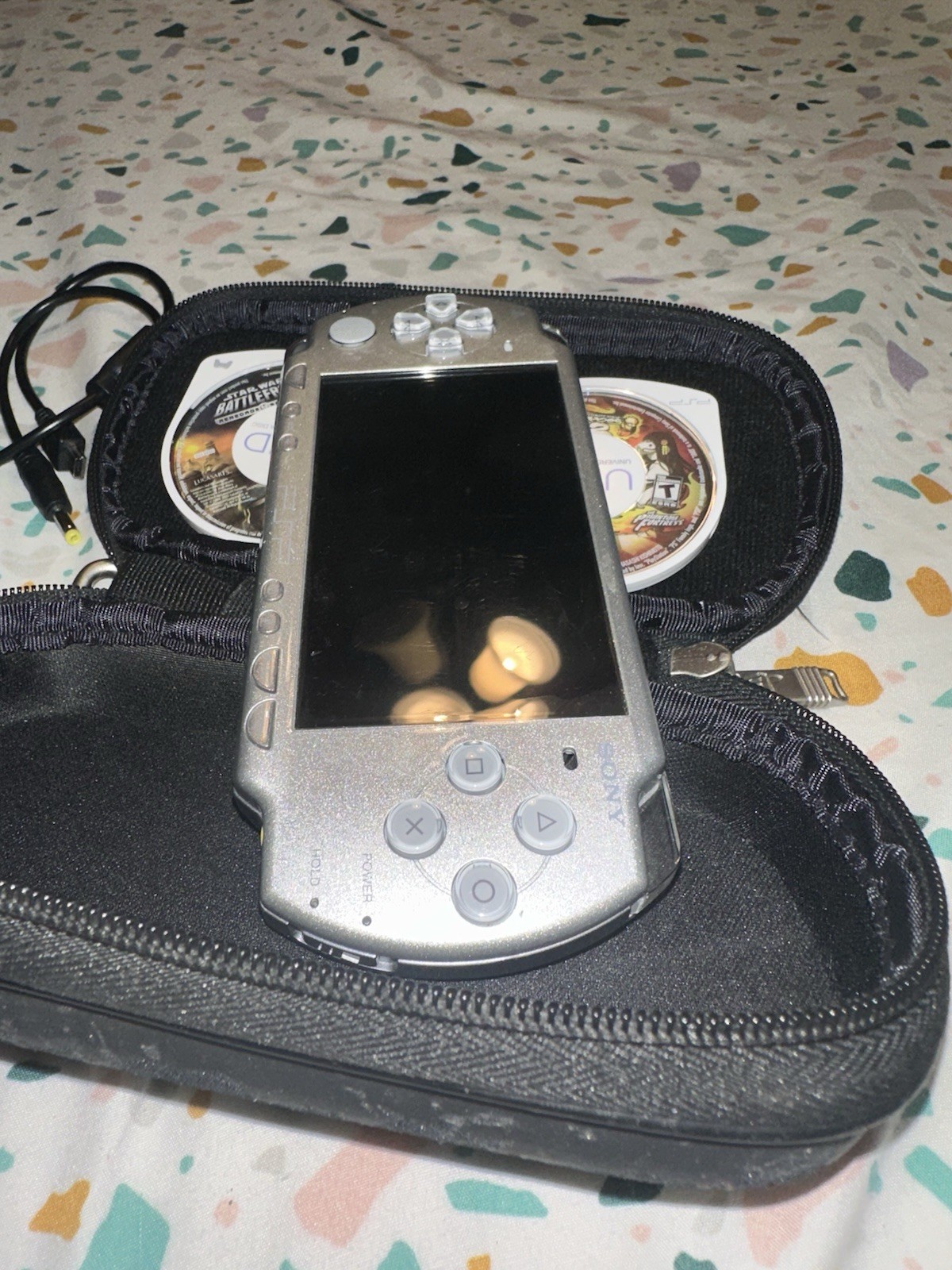 PSP 2001 Silver CONSOLE W/2 Games And Charger Tested