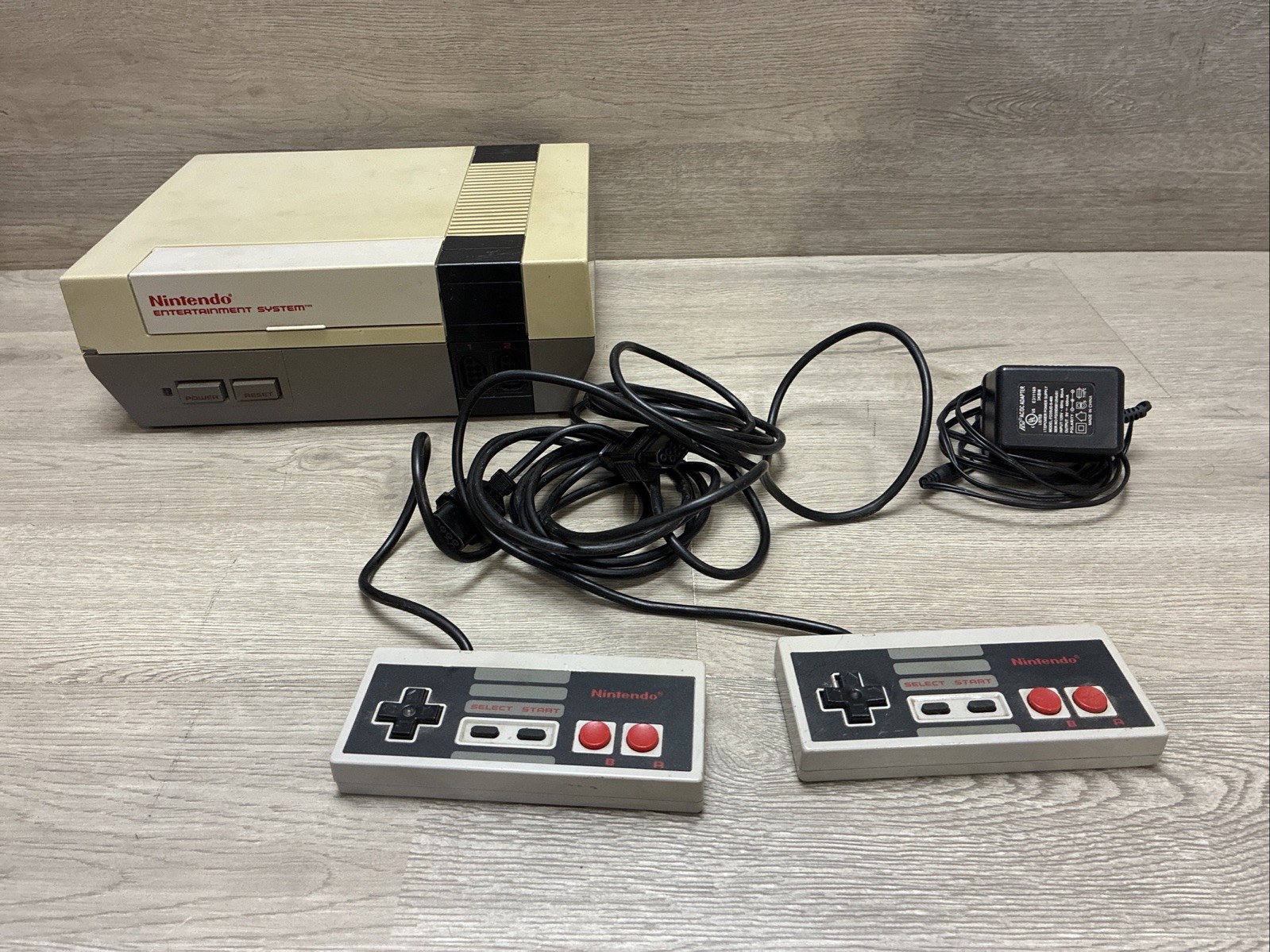 NINTENDO ORIGINAL CONSOLE MODEL NES-001 & (2) Remotes