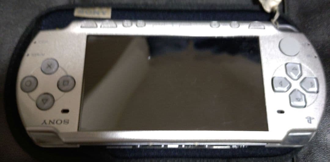 PSP-2000 Ice Silver with Strap, No Battery or AC Adapter, Clean Condition