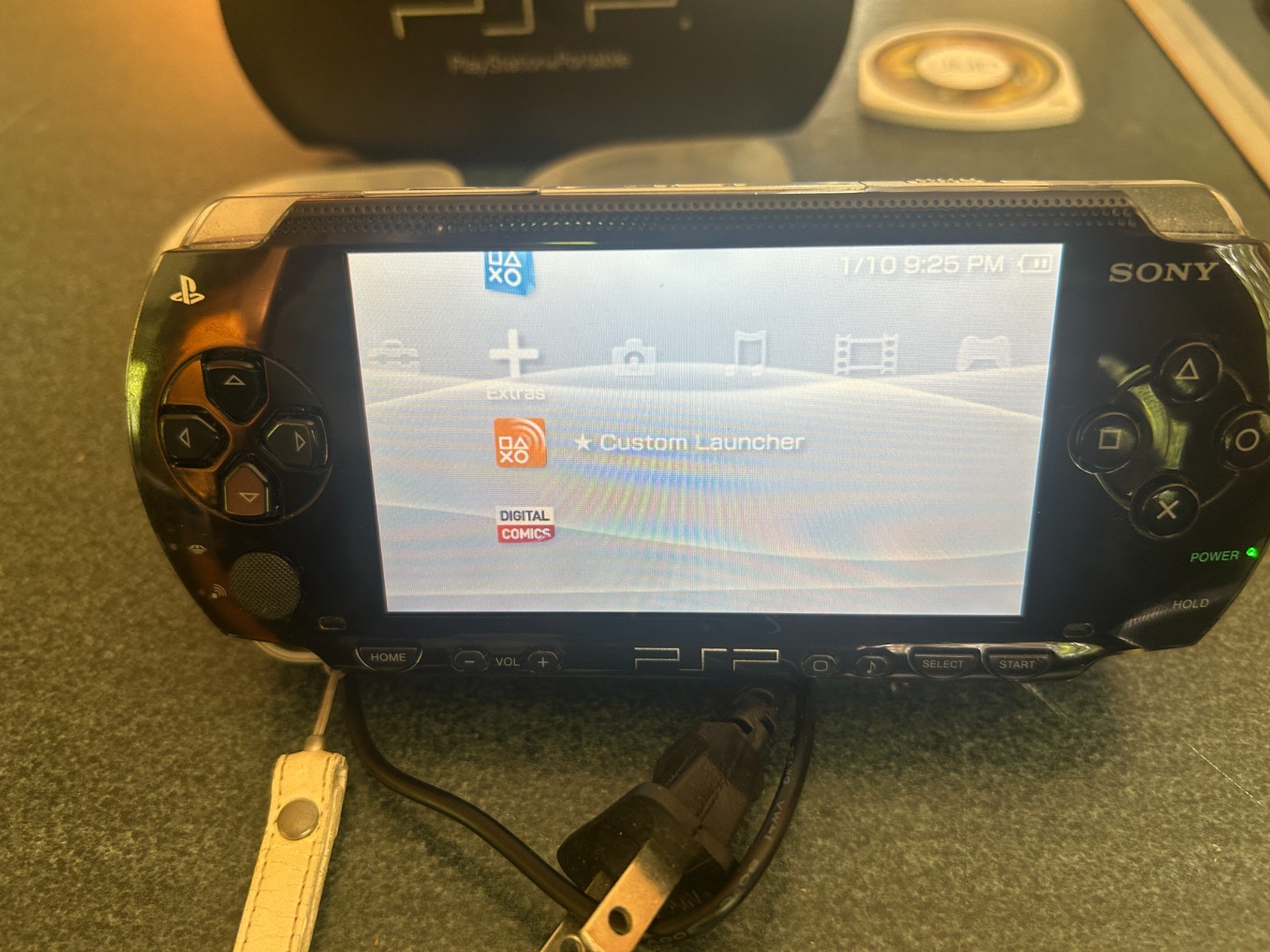 Sony PlayStation Portable console PSP-1004 with 8 games & 3 memory sticks