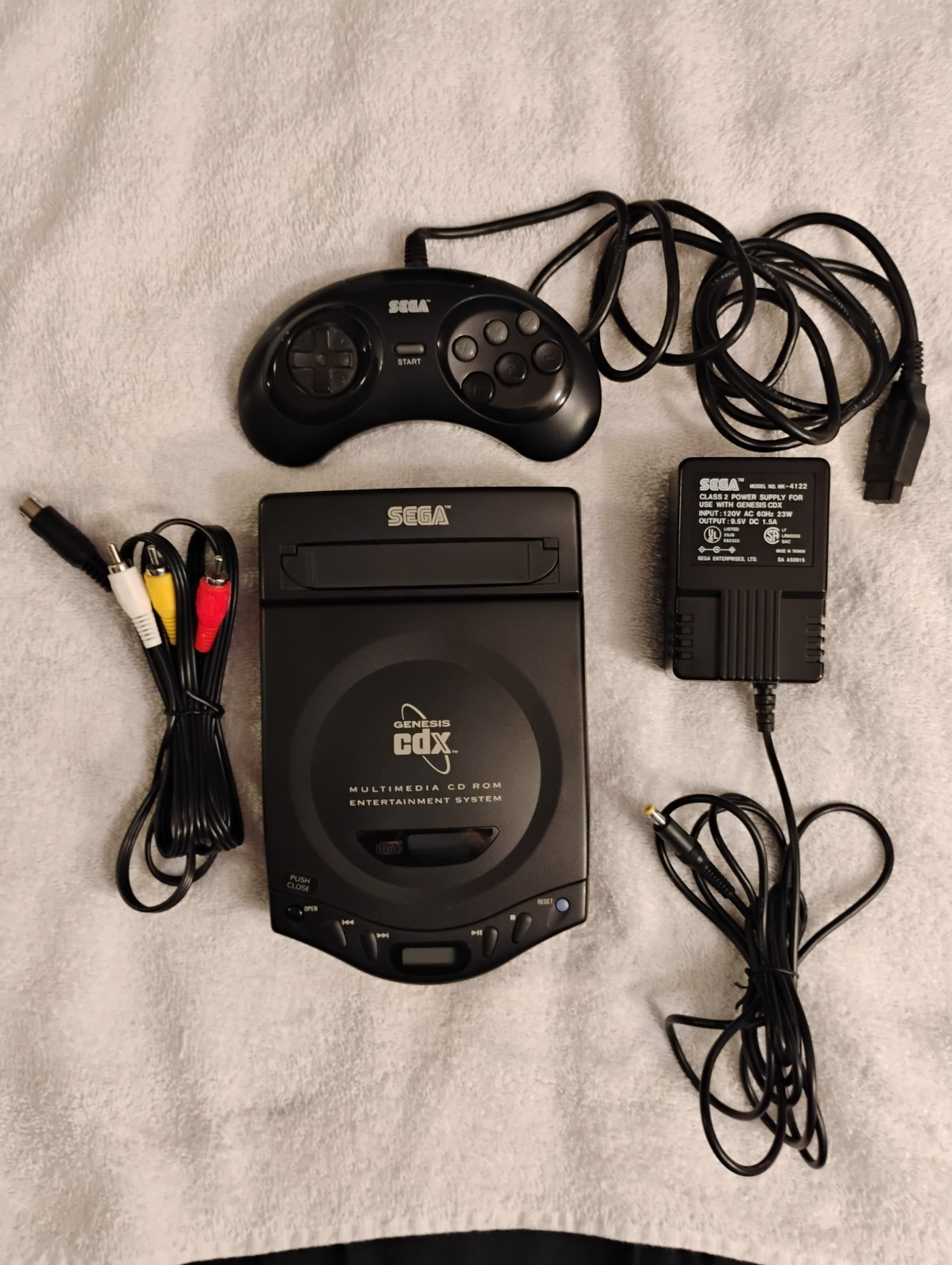 Sega Genesis CDX Console with box and carrying case.