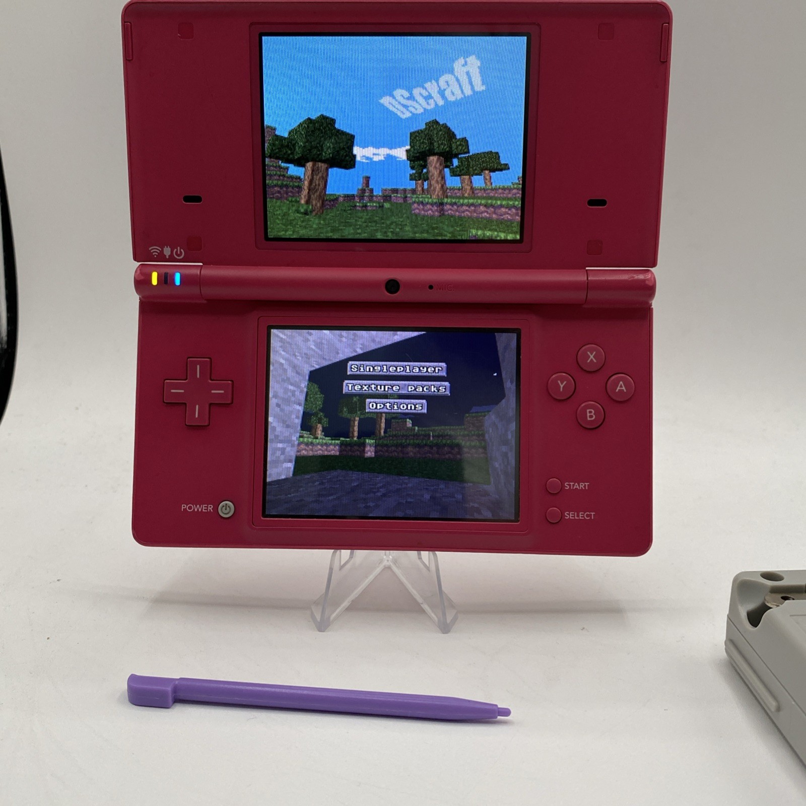 Nintendo DSi Hot Pink – Includes Preloaded Library (Large Collection)