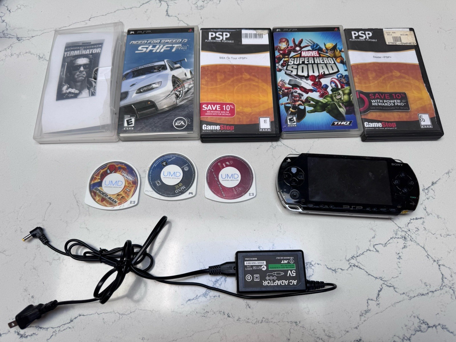 Sony PSP-1001 PlayStation Portable – Black With 8 Discs And Power Cord
