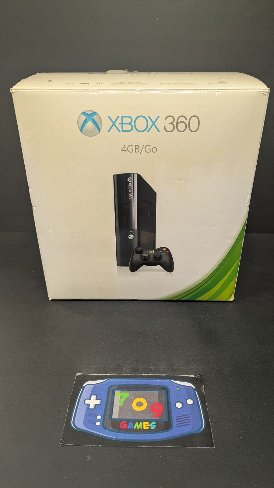 Xbox 360 E 4GB System Console Brand New Factory Open Box Broken Seal