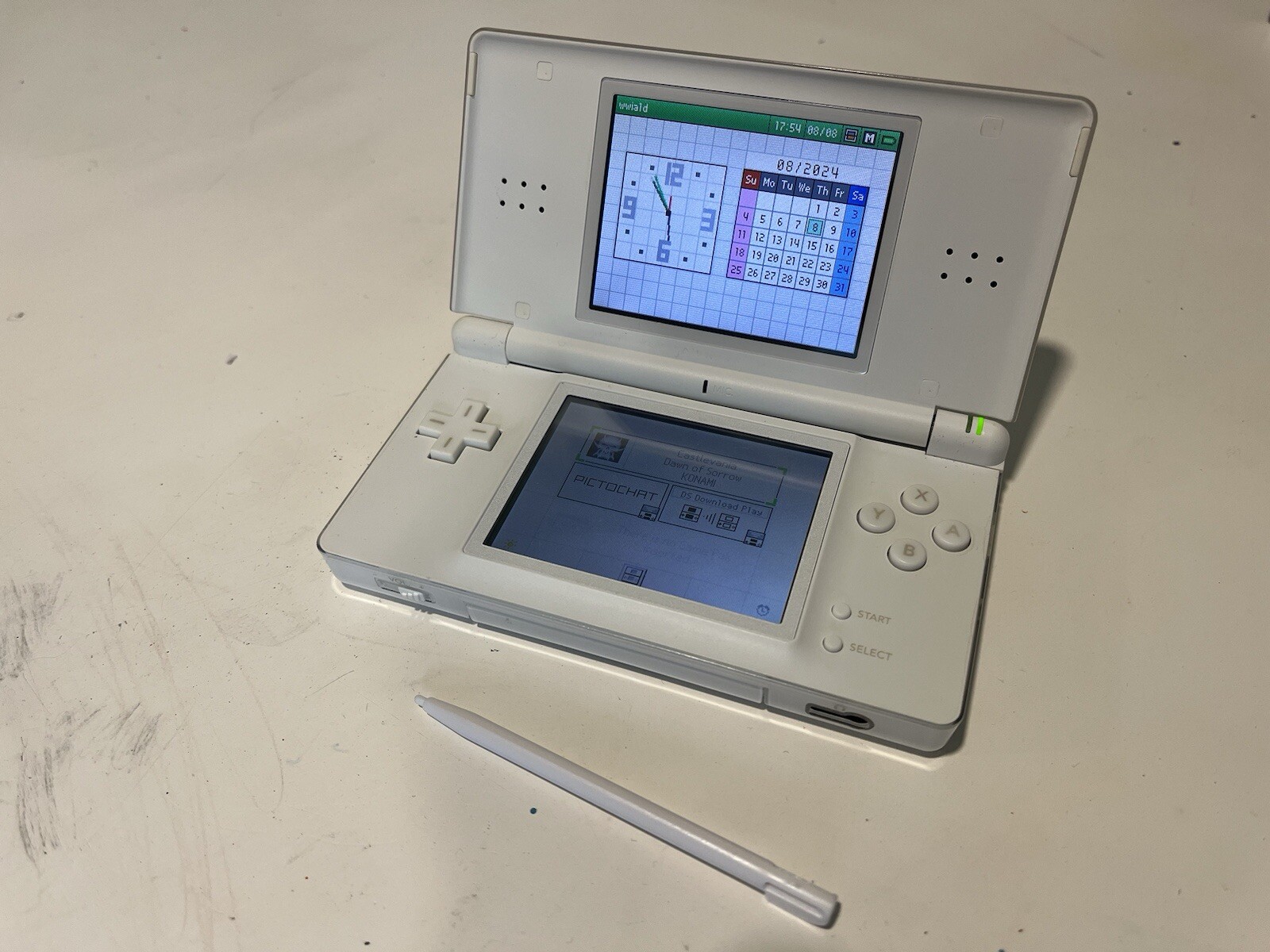 Nintendo DS Lite Handheld Console – Polar White and 3 Games