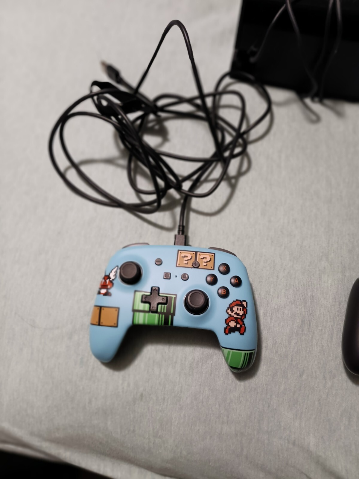 Nintendo Switch. Blue and red controller.
