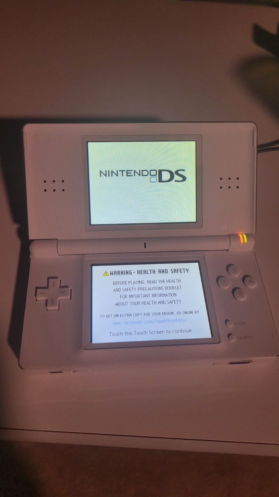 Nintendo DS Lite Handheld Console – Polar White With Charging Cord