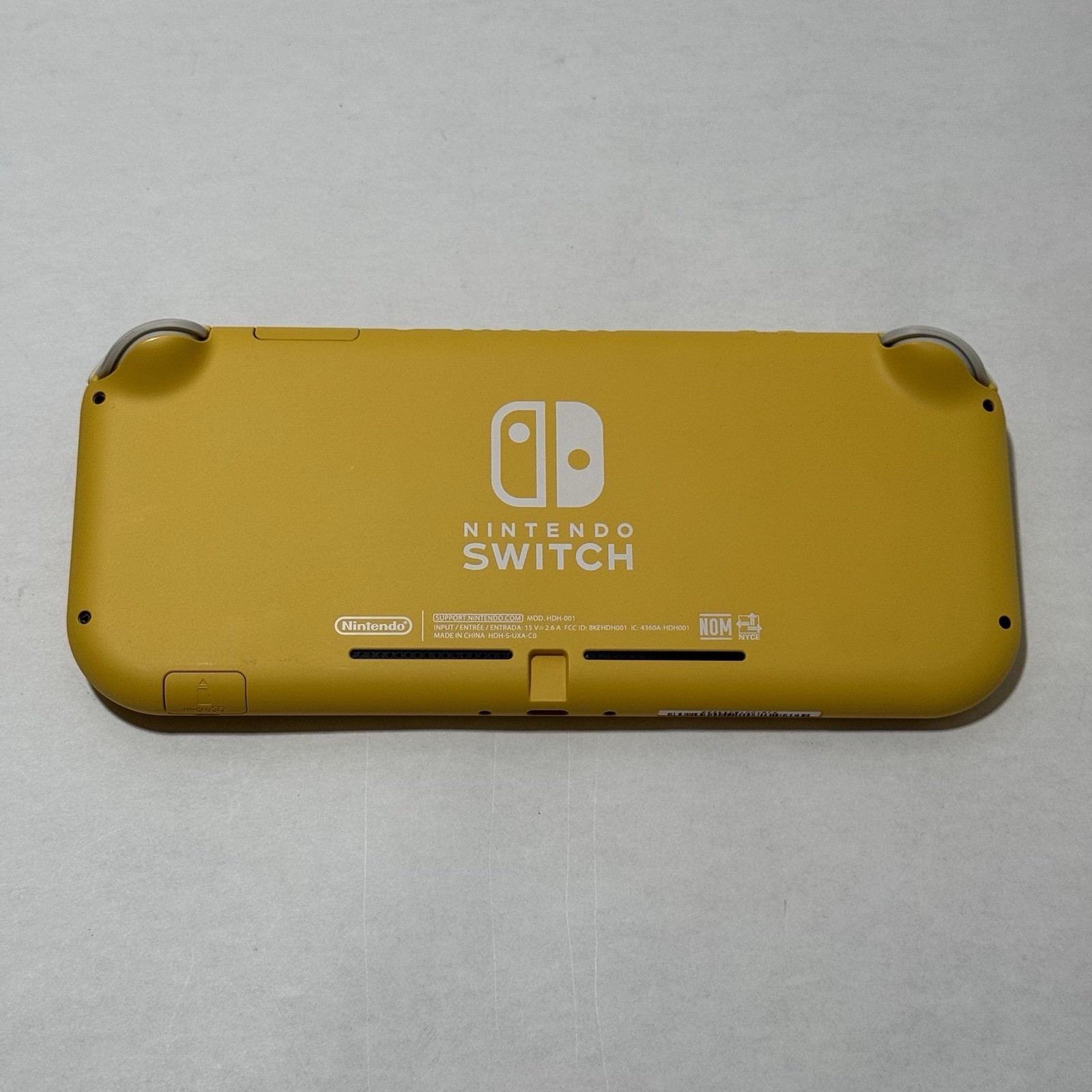 Nintendo Switch Lite Console Yellow + Protection Gear Bundle (COMPLETELY BOXED)