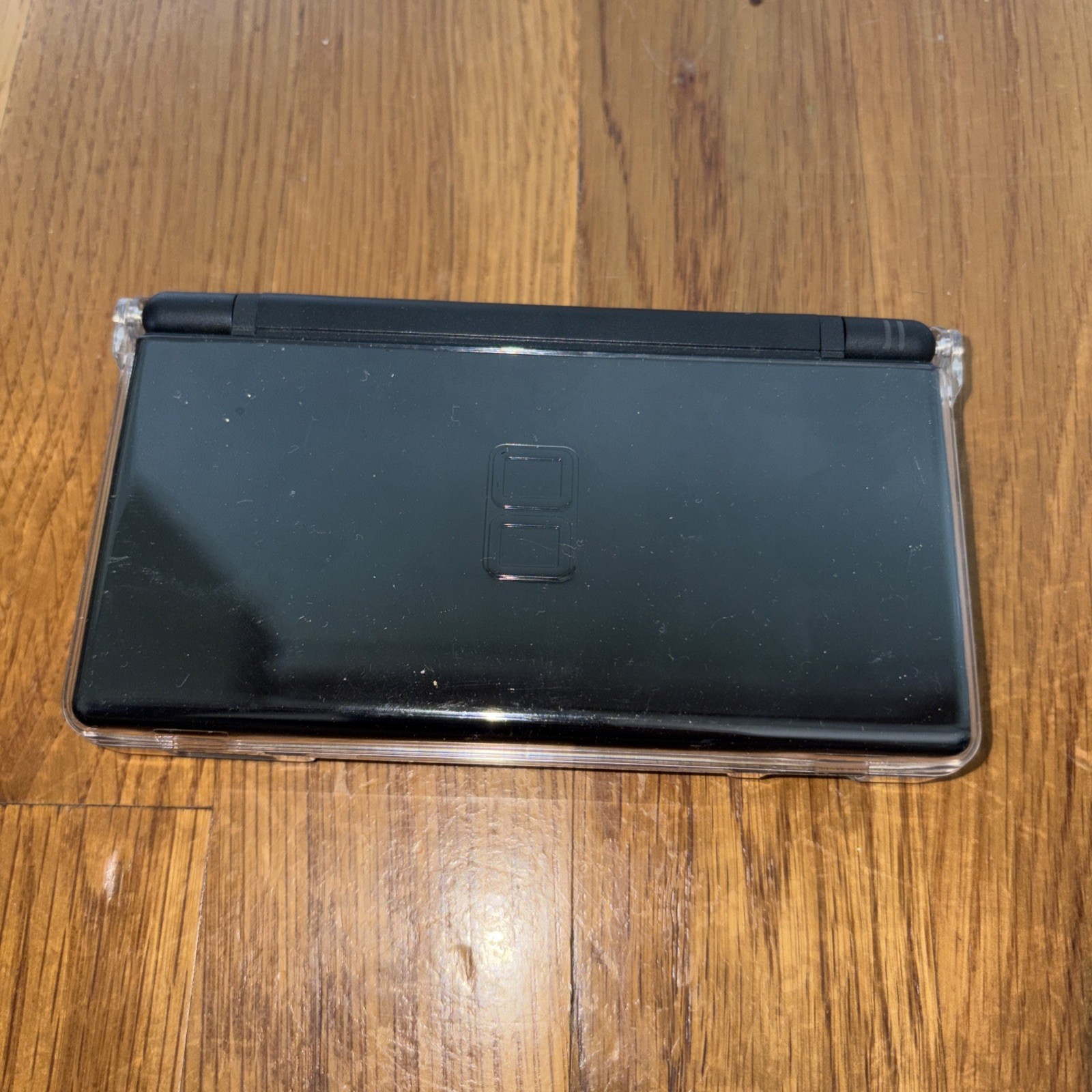 Nintendo DS Lite Console Black with charger case and four games model USG-001