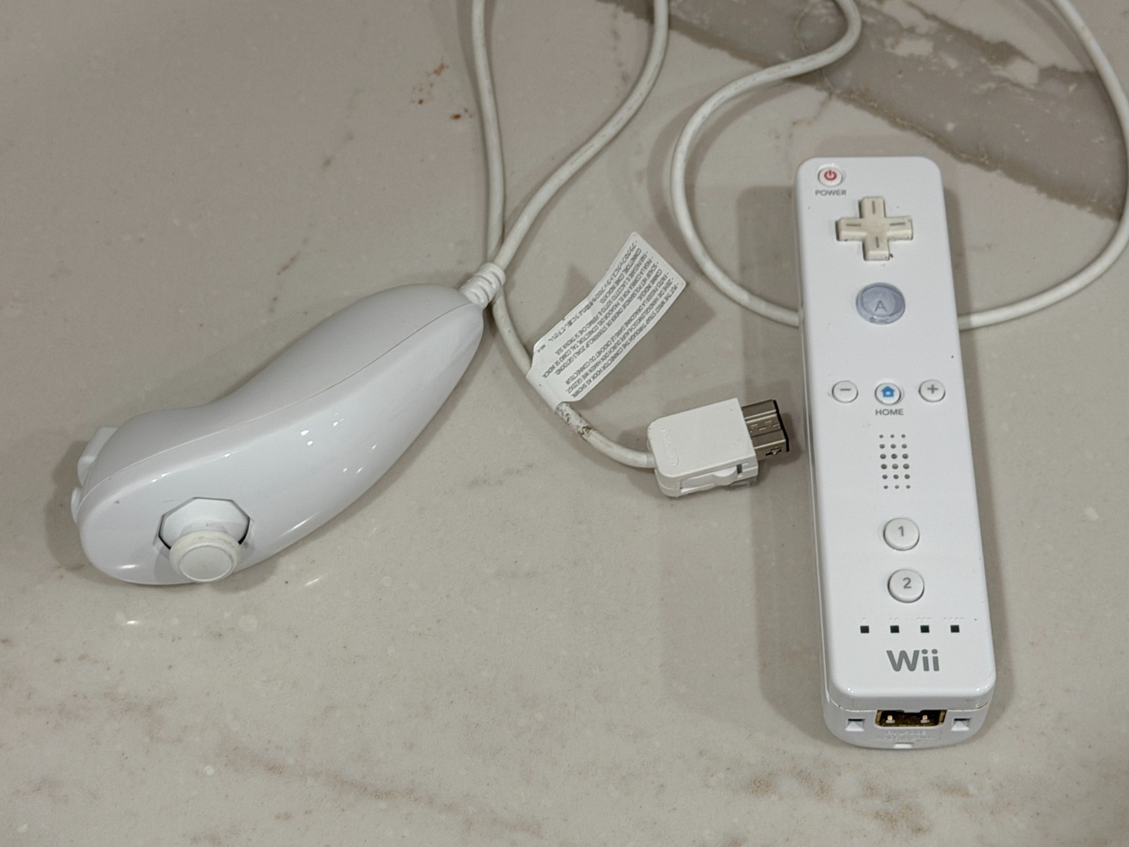 Nintendo Wii Console with Wii Remote, Nunchuck, Wires, Super Mario Sluggers Game