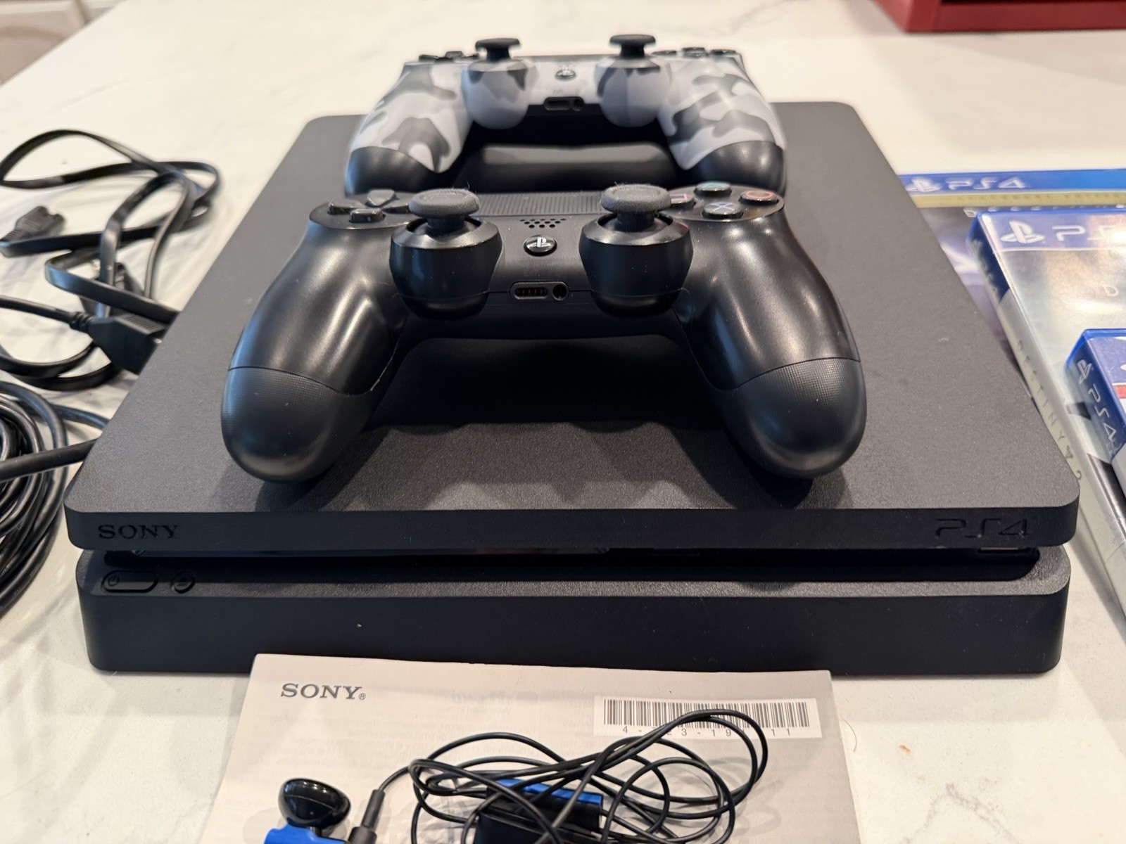 SONY PS4 PlayStation 4 1TB Bundle Games Cords Controllers Ear Piece.