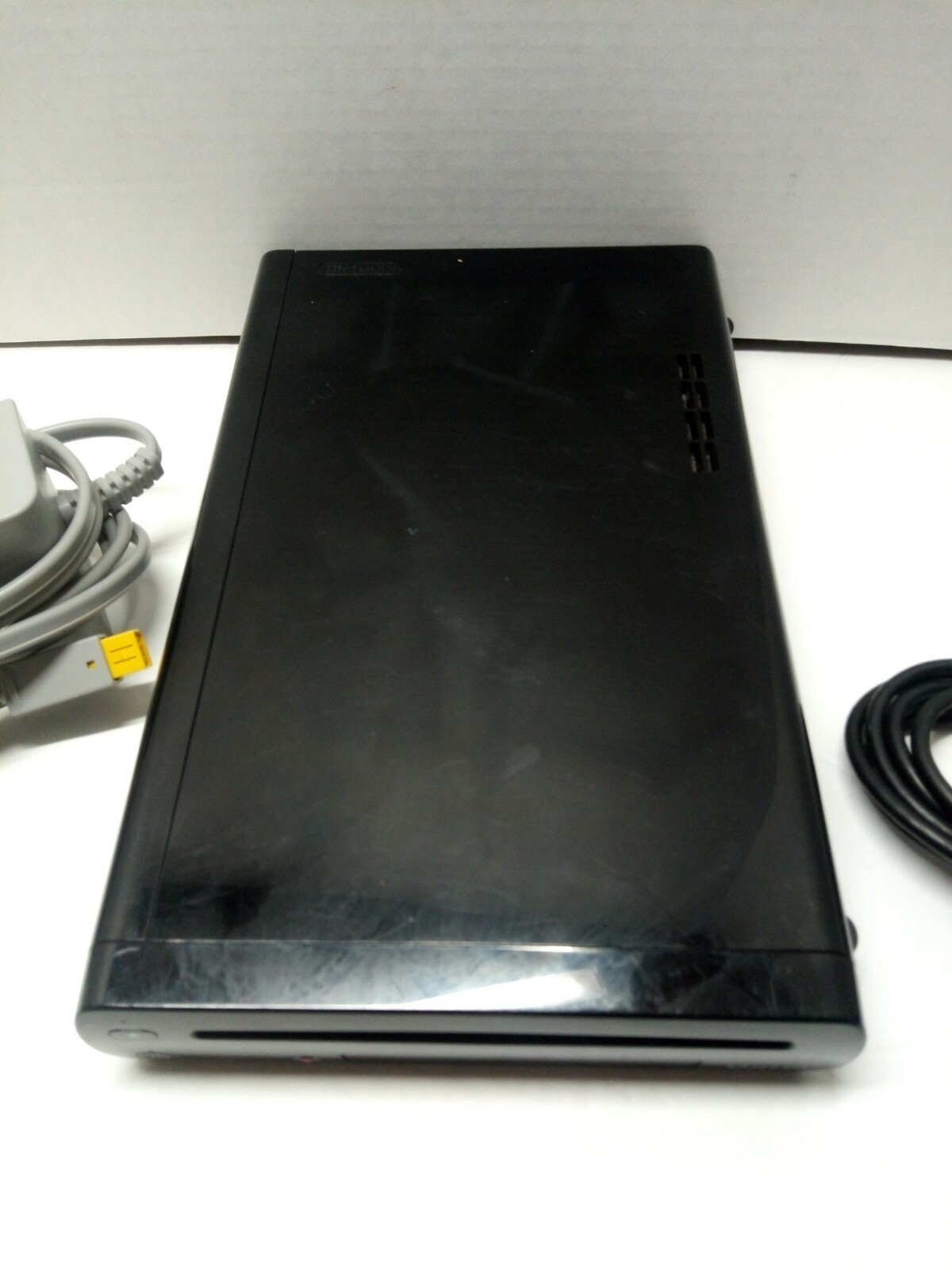 Nintendo Wii U 32GB System Console Only Black. Includes power cord