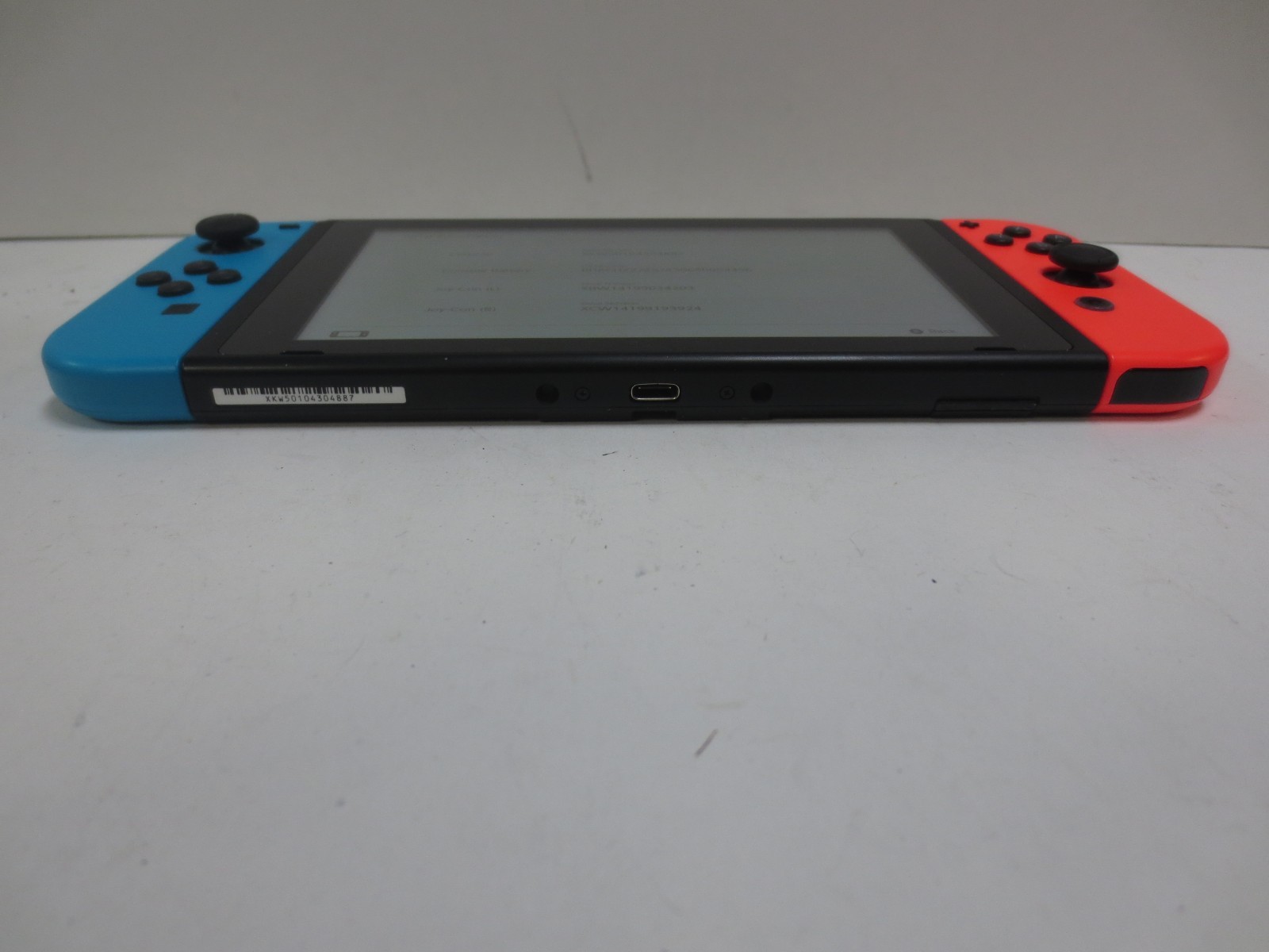 Nintendo Switch Console HAC-001(-01) w/ Neon Red and Blue Joycons