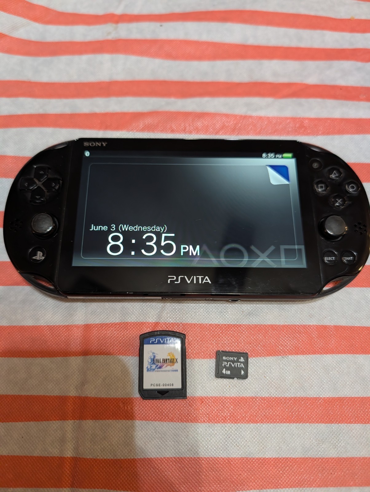 PlayStation PS Vita Slim PCH-2001 Black, 4GB Card + Final Fantasy X Remastered