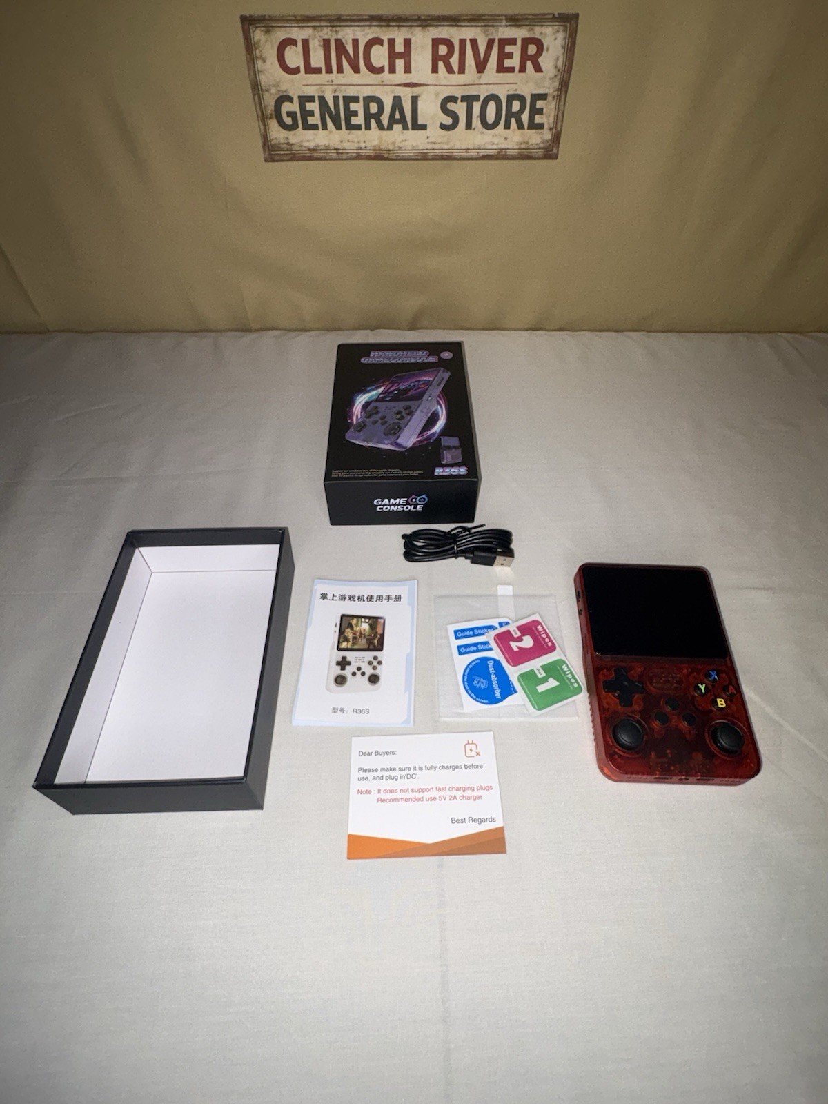 R36S Handheld Game Console Transparent Red Dual Joystick Wi-Fi Bluetooth