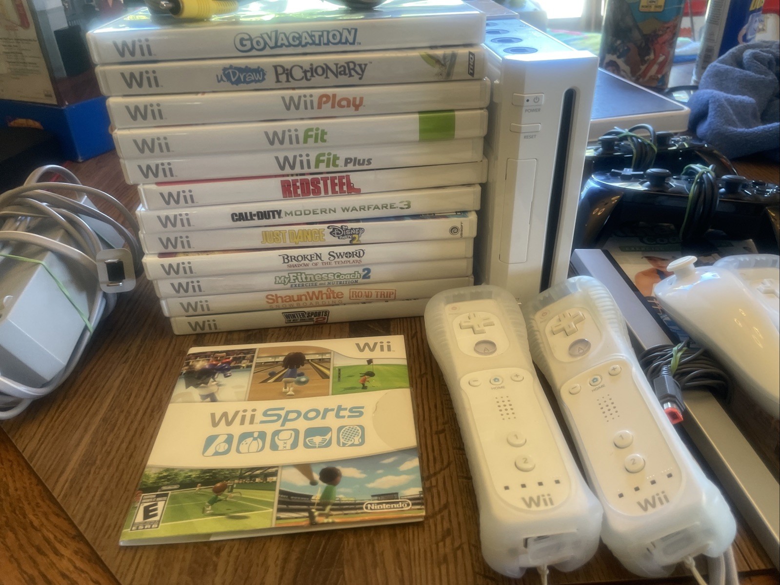 Nintendo Wii Console with Wii Sports – Multiple Controllers And Games. Tested!