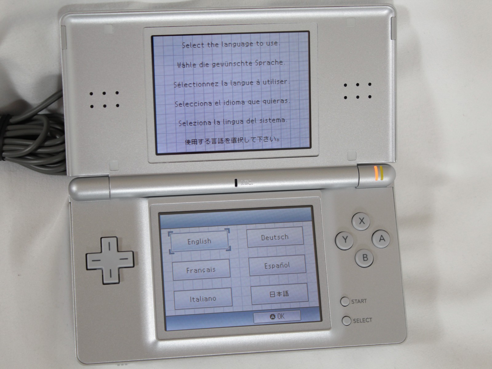 Nintendo DS Lite Handheld System Silver Never Used Never Played UNUSED/NEW COND.