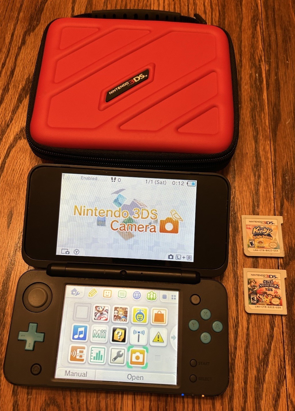 Nintendo 2DS XL Handheld Console w Mario Kart 7 Black/Turquoise Kirby Smash Case