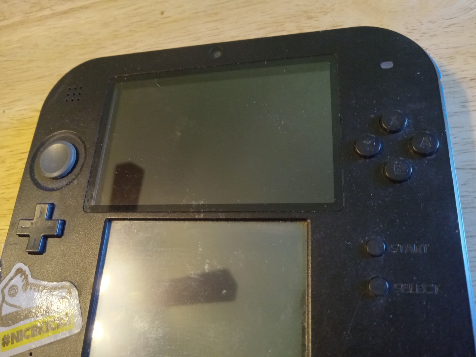 Nintendo 2DS Blue Handheld Console FOR PARTS OR REPAIR Won’t Charge
