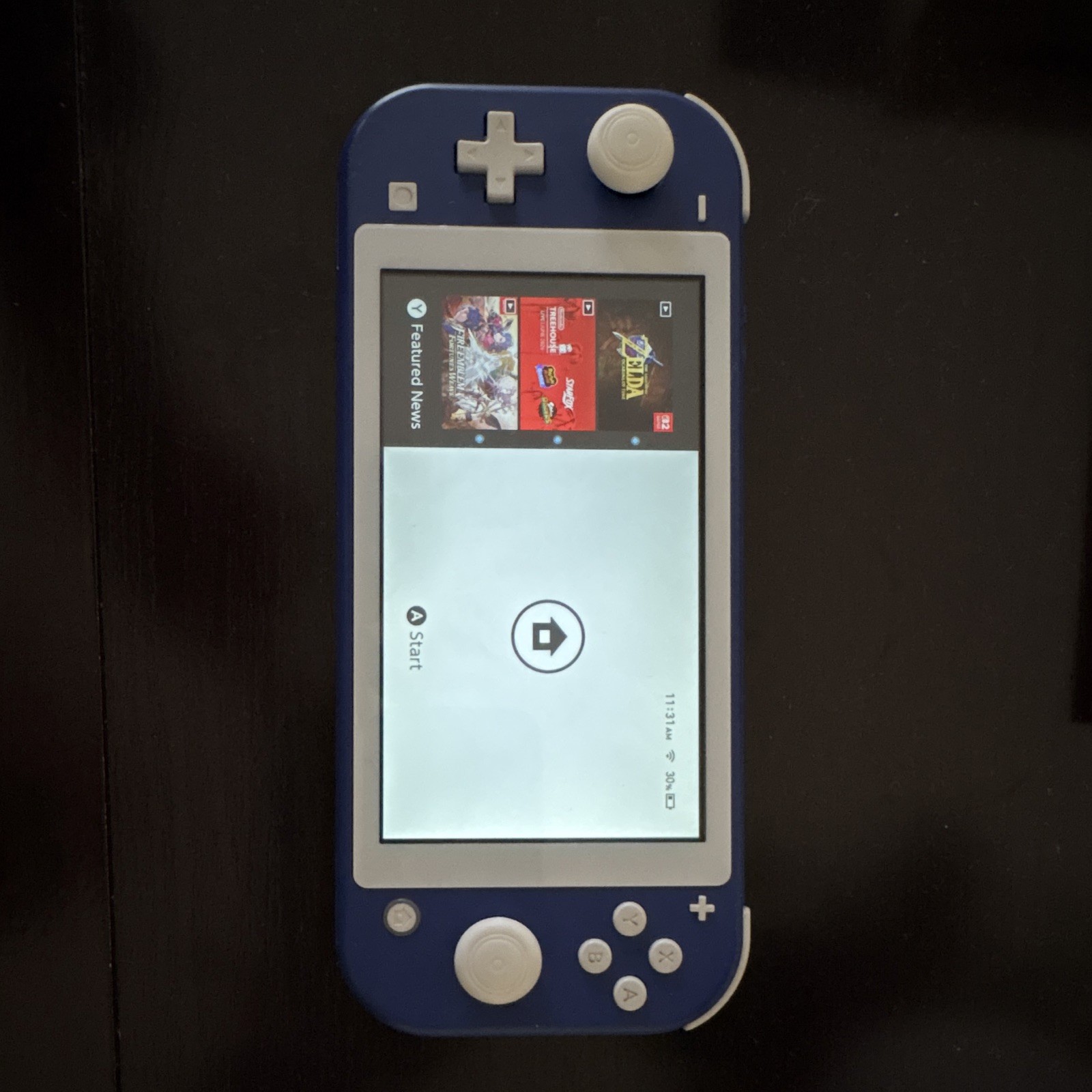 Nintendo Switch Lite Blue + Carrying case + Game