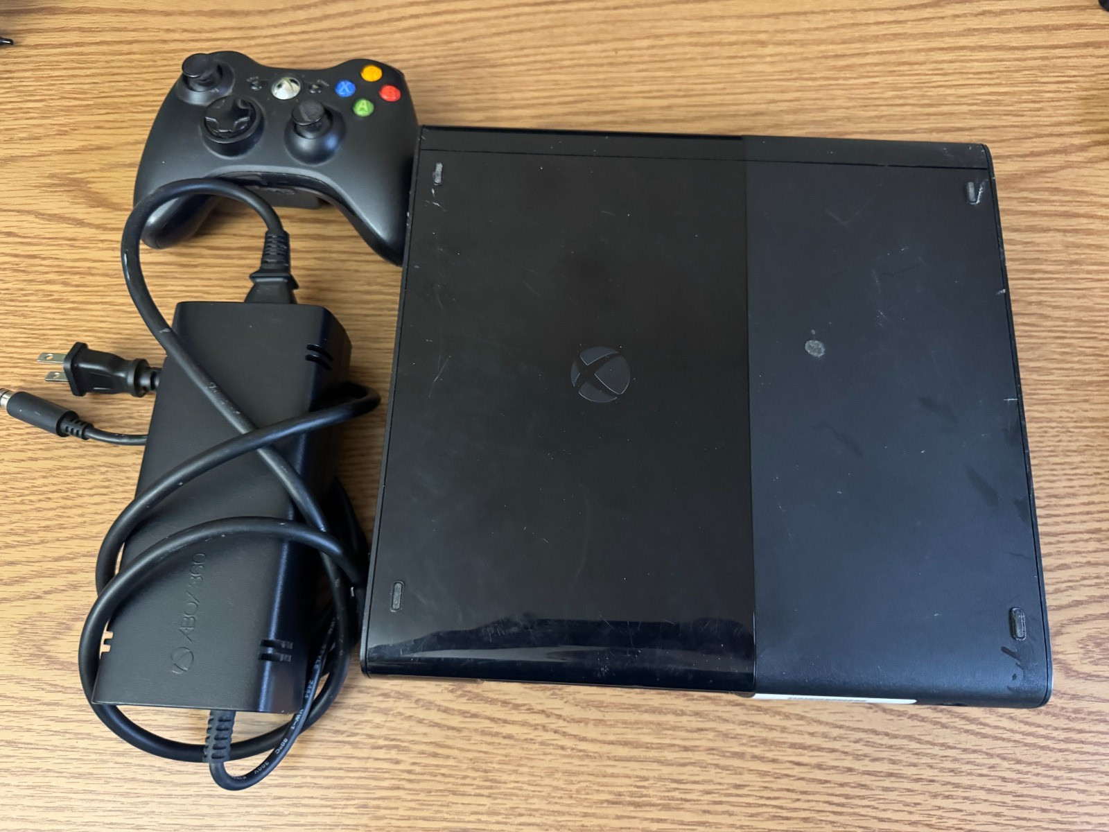 Microsoft Xbox 360 E System Black Gaming Console Controller And Adapter.