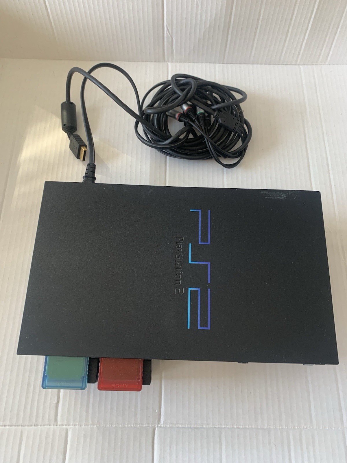 Sony PlayStation 2 Fat Console W/ Cables, HDMI Cable And Memory Cards