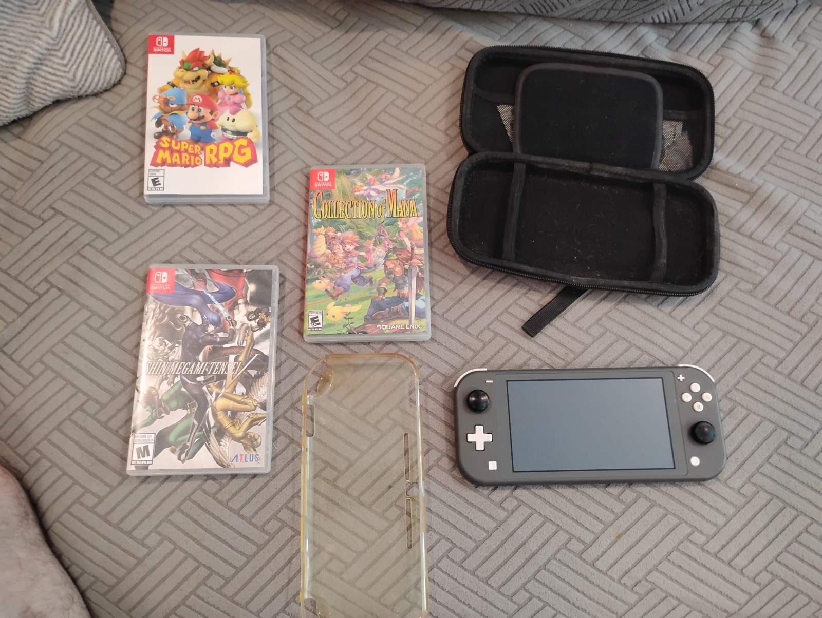 Nintendo Switch Lite (Black) + 3 games and accessories lot