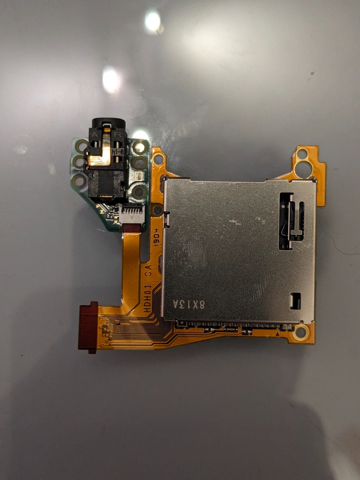 Nintendo Switch Lite game card reader and headphone jack