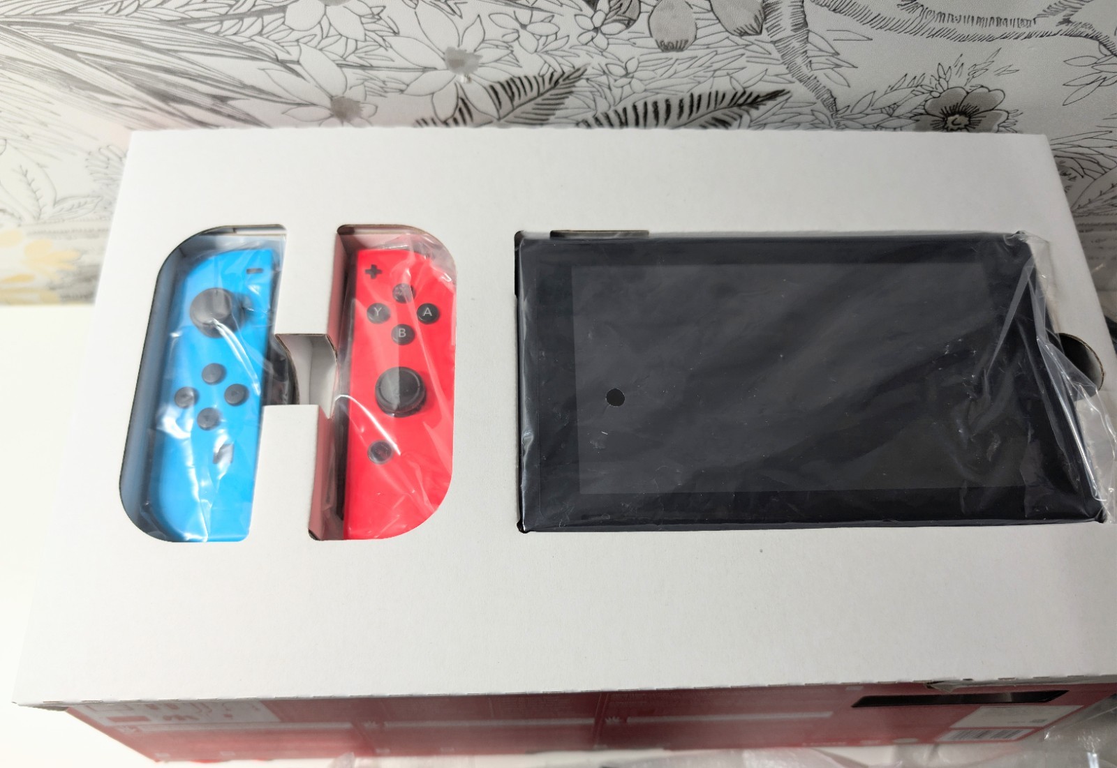 Nintendo Switch 32GB Handheld Console – Neon Red/Neon Blue