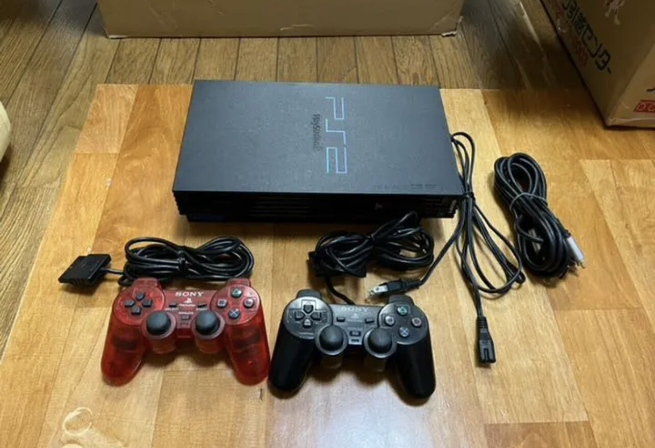 Sony PlayStation 2 Black Home Console/30 or more cassettes