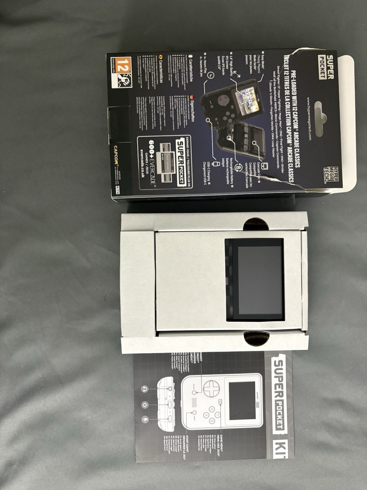 CAPCOM x KITH FOR HYPER MEGA TECH SUPER POCKET HANDHELD CLEAR CONSOLE