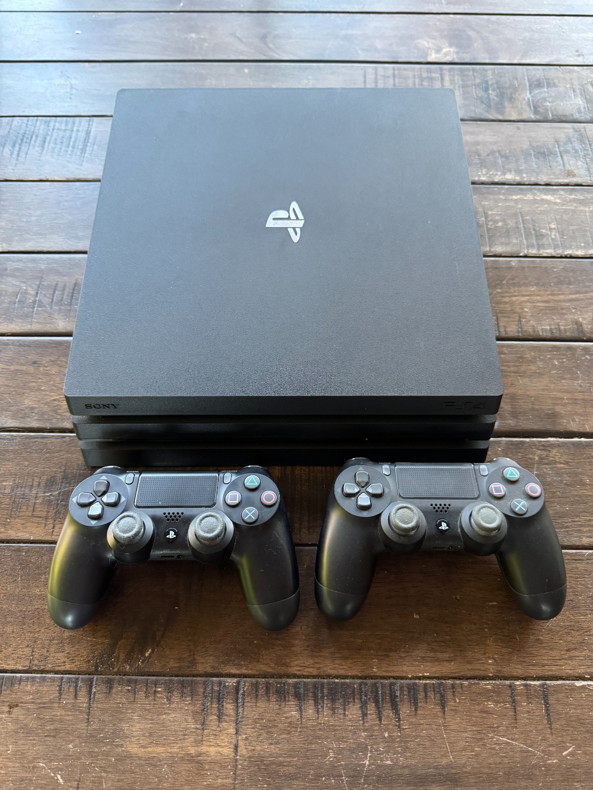 PS4 Pro 1TB with 2 DualShock controllers and power cable Tested Great Condition!