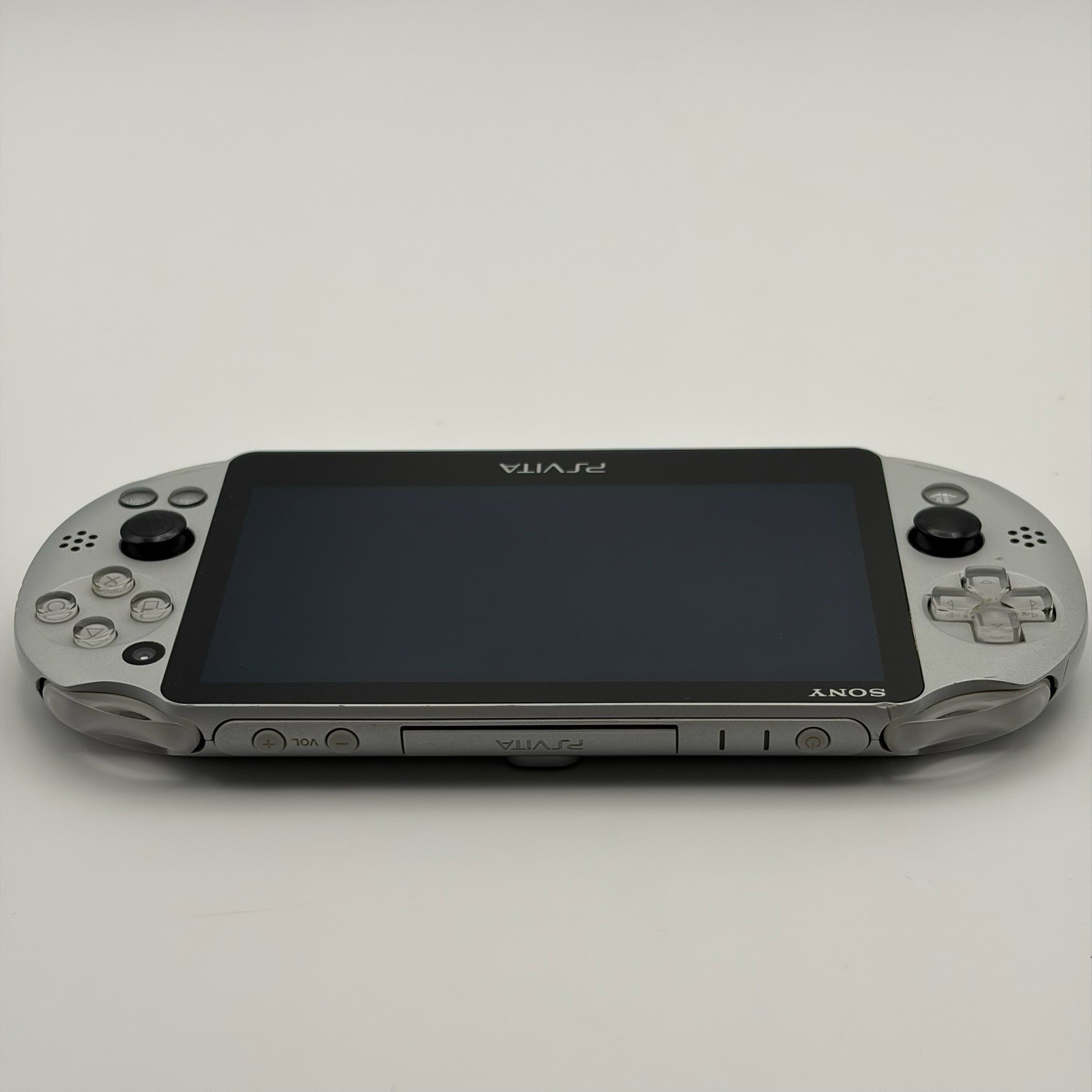 SONY PS Vita PCH-2000 Console Silver Very Good Fast Shipping No joystick drift.