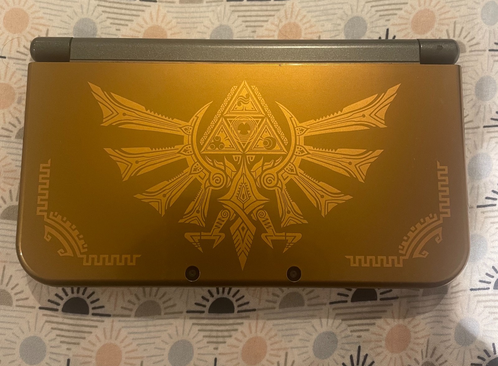 New Nintendo 3ds XL Handheld System Hyrule Gold Edition (Case + Charger)