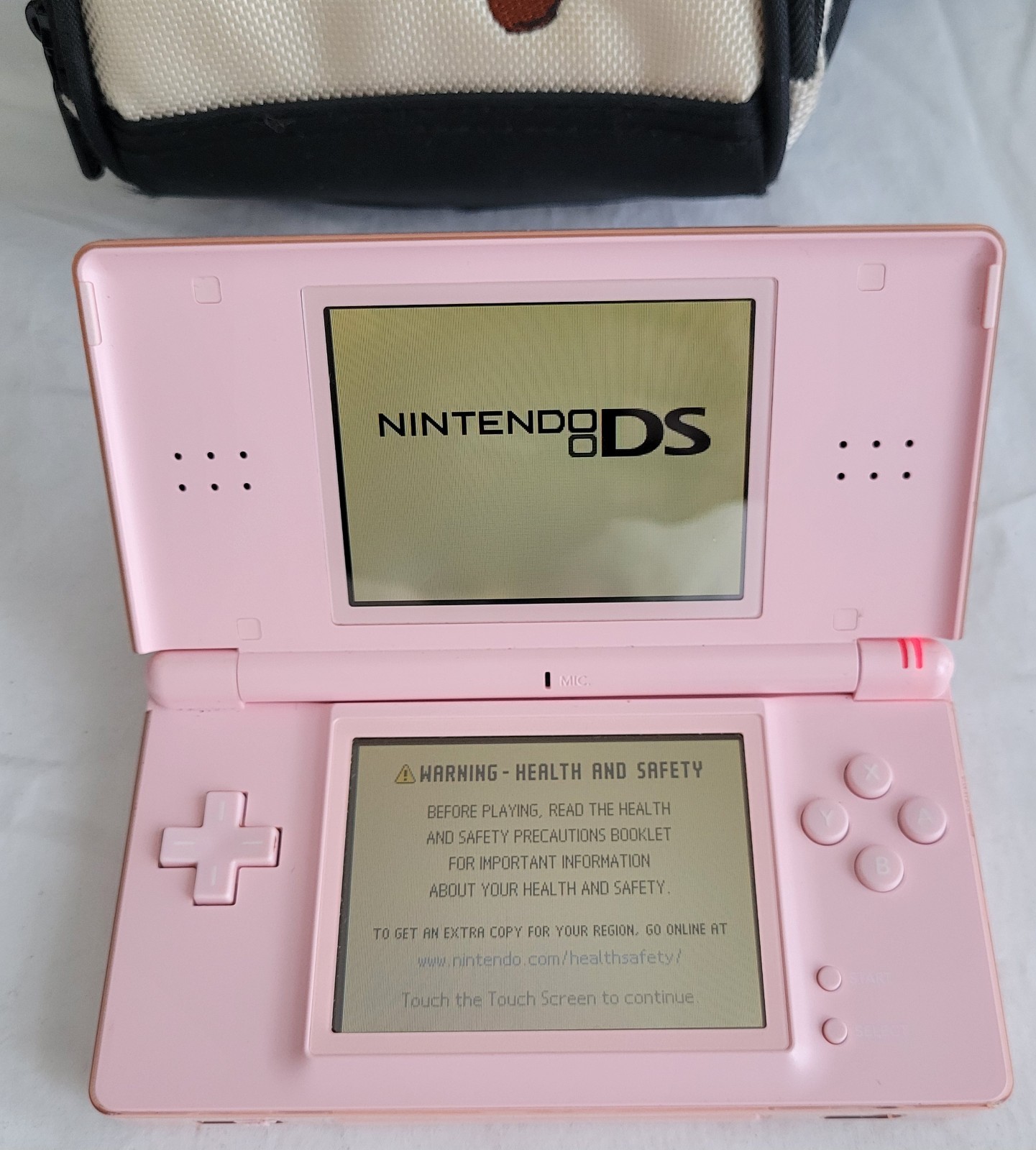 Nintendo DS Lite Coral Pink Bundle 2 Games & Super Mario Backpack/case
