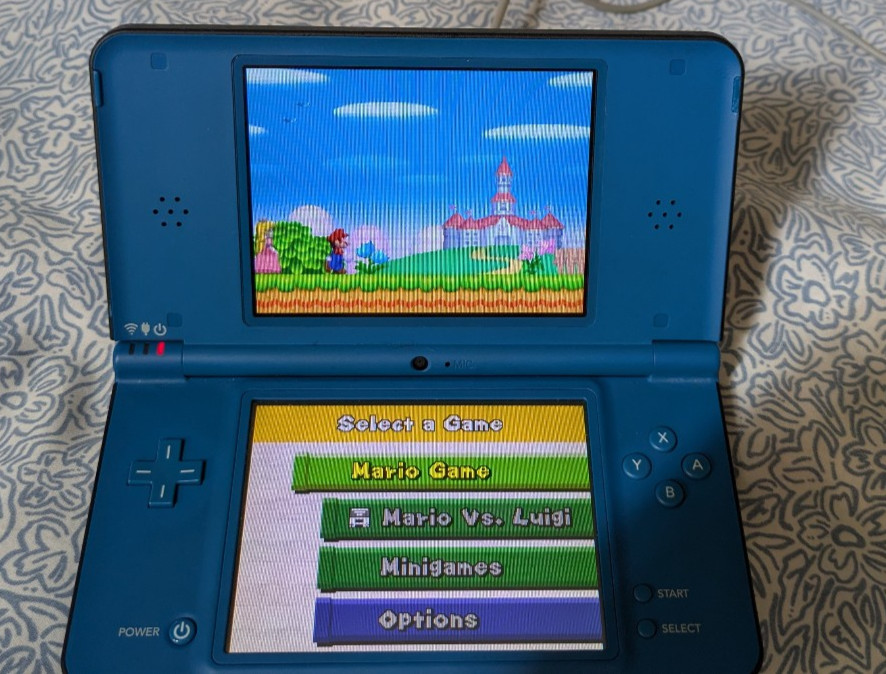Nintendo DSi XL Midnight Blue. Tested and Working. FREE SHIPPING.