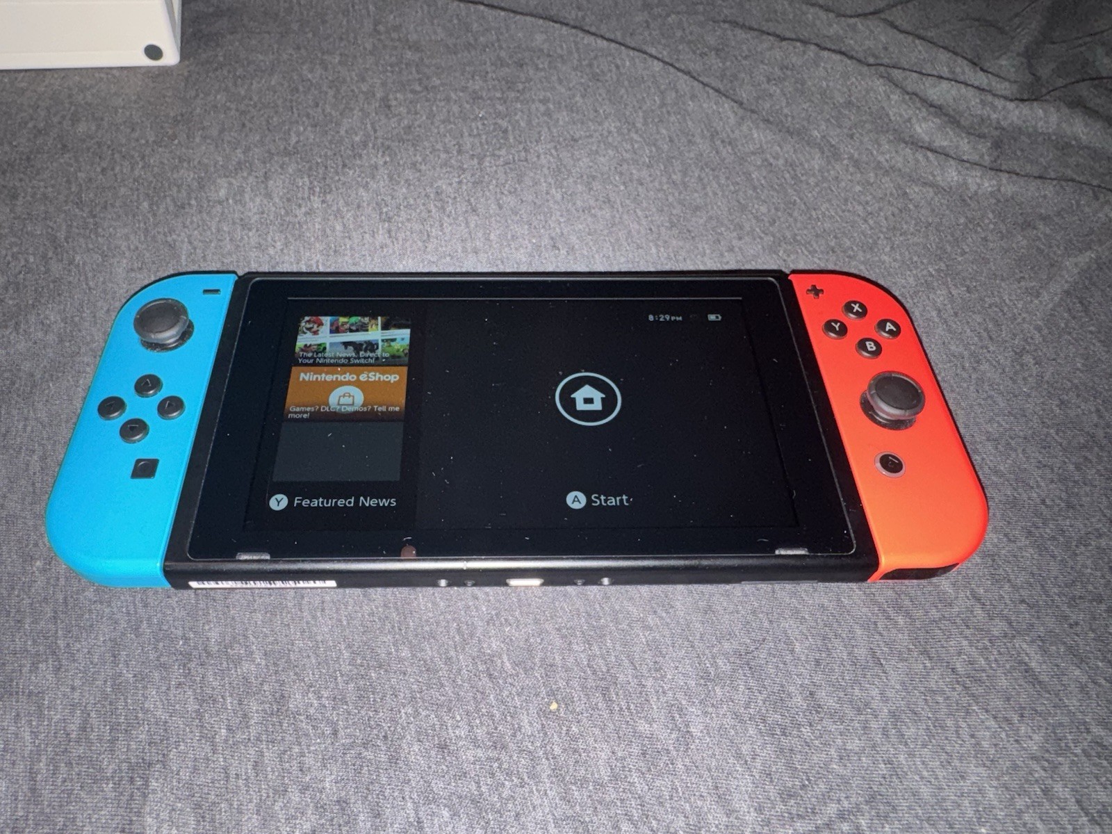Nintendo Switch Console Neon Red/Blue Joy-Con Handheld 32GB 1080p Wi-Fi USB-C