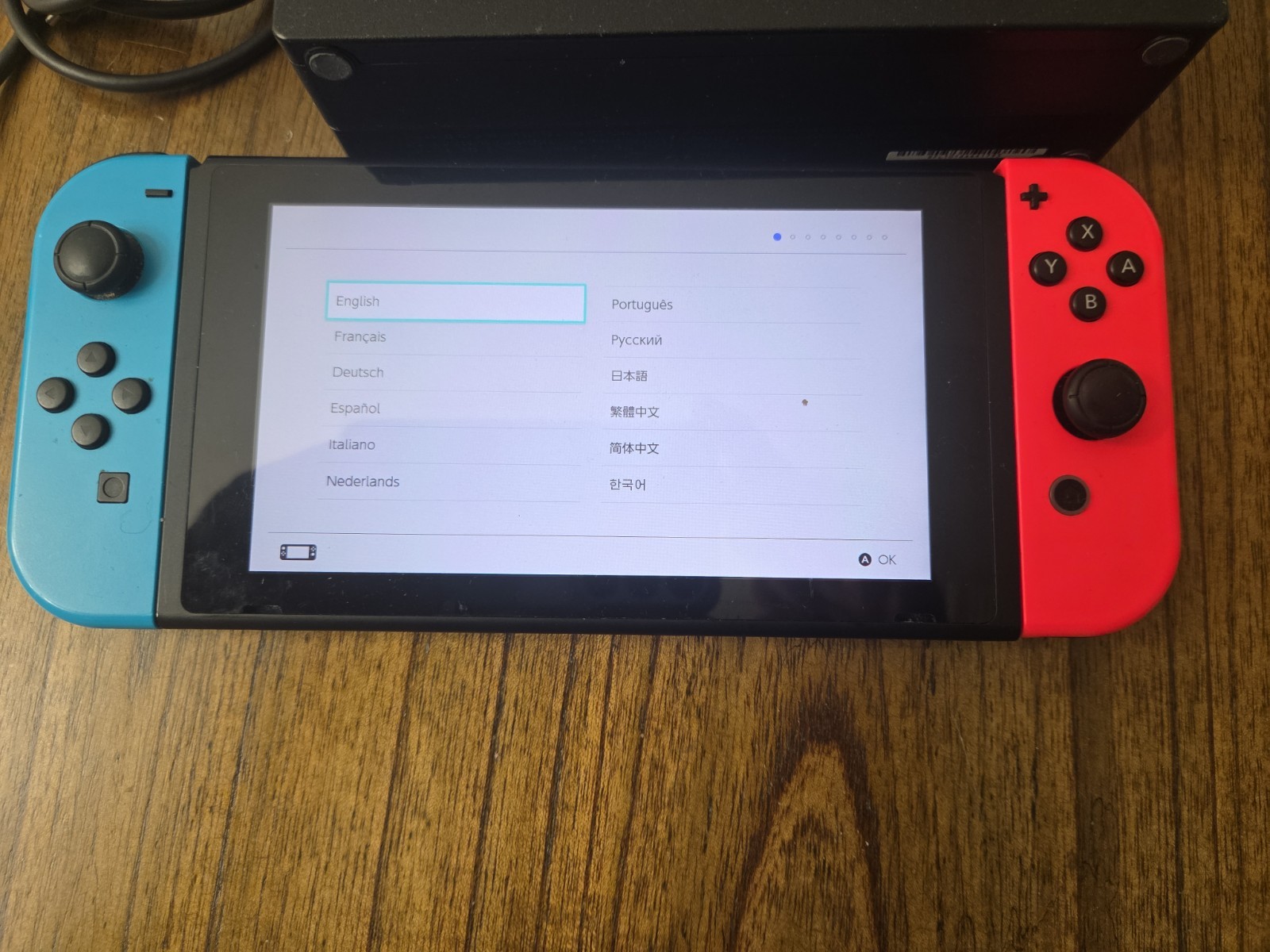Nintendo Switch Console with Neon Red and Blue Joy-Cons, Plus Games
