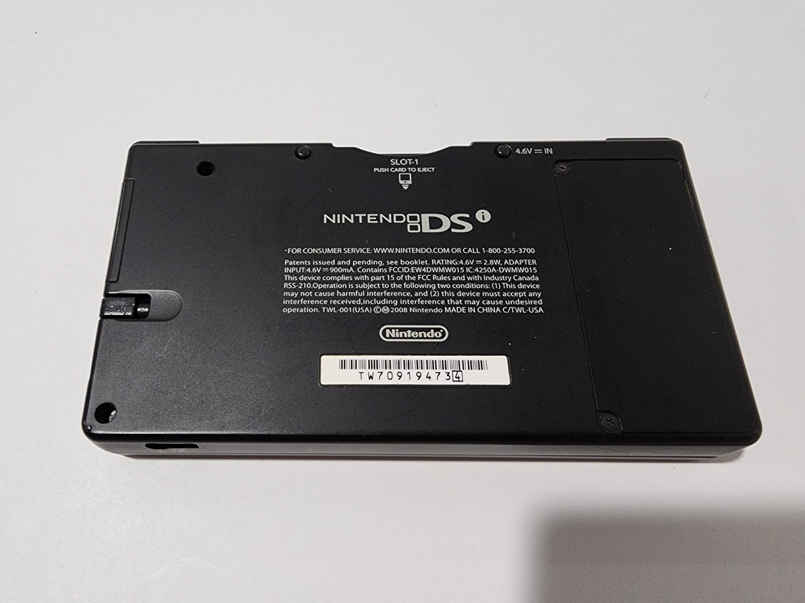 Nintendo DSi Launch Edition Black Handheld System with 7 Games