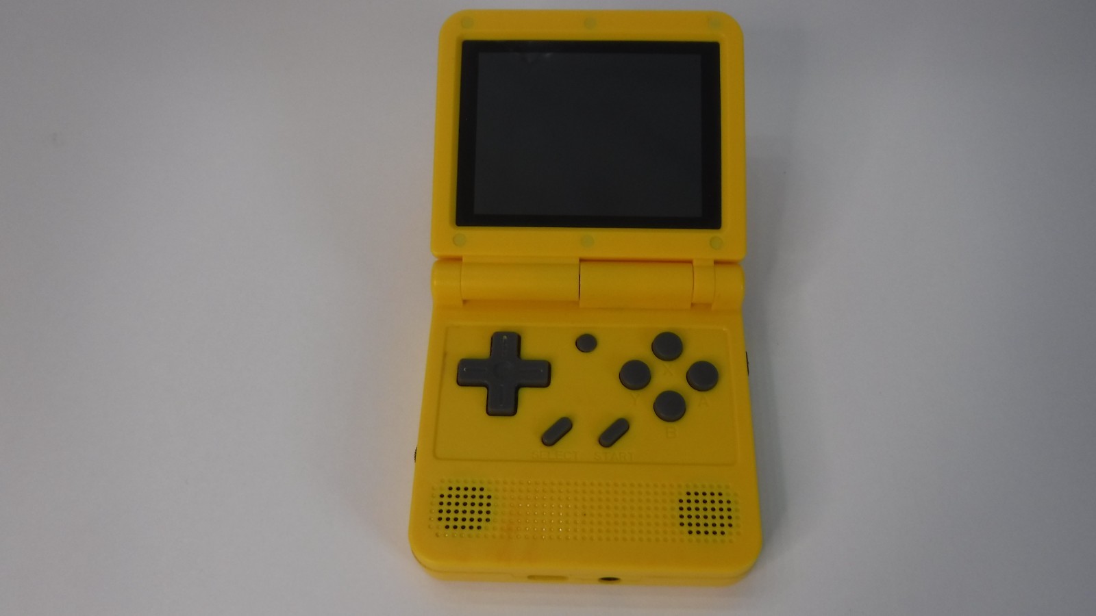 Powkiddy V90 3.5 Inch Foldable Retro Flip Handheld Game Console running Miyoo