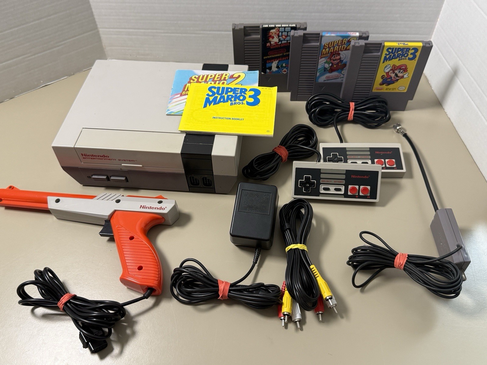 Nintendo NES Console Bundle with Super Mario Bros 1 2 3 + 2 Controllers & Zapper