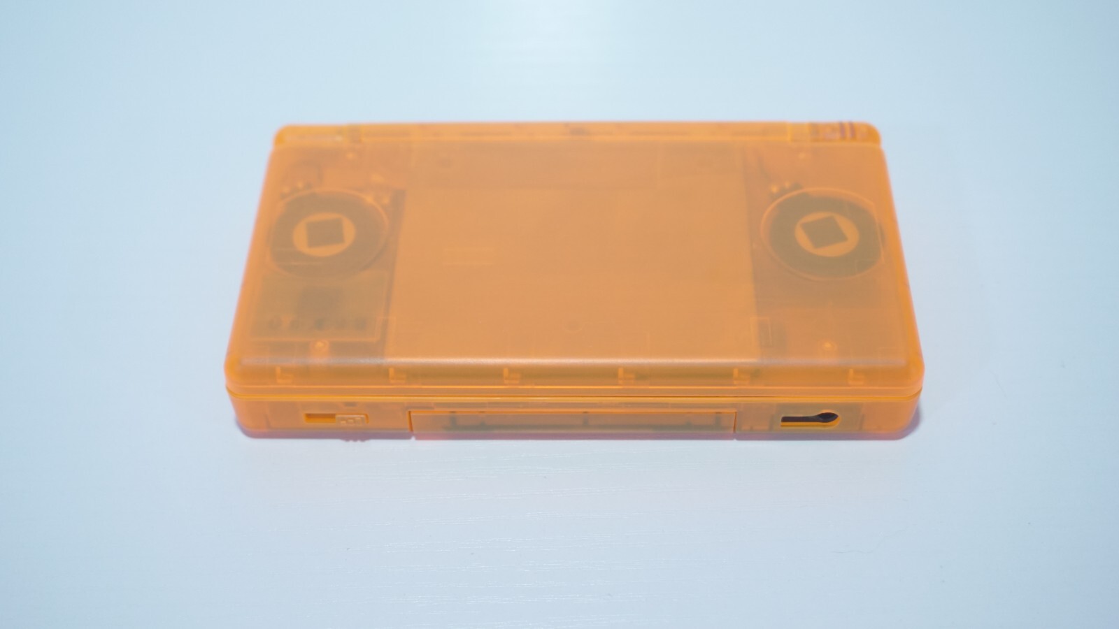 Nintendo DS Lite Transparent Clear Orange Handheld System with Charger & Stylus