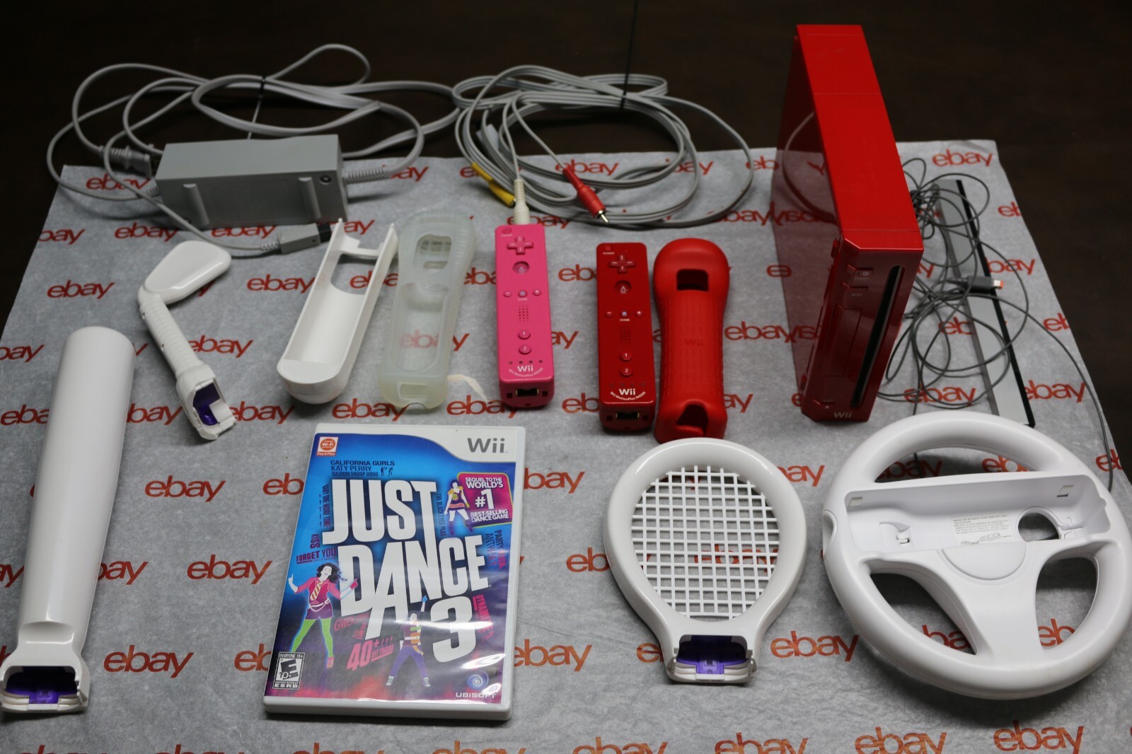 Limited edition NINTENDO WII red color w/ a lot of accessories and game NICE