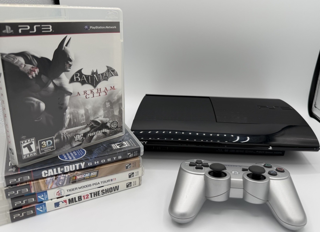 Sony PS3 Super Slim 250GB SAMSUNG SSD Console Bundle Refurbished – 5 Games